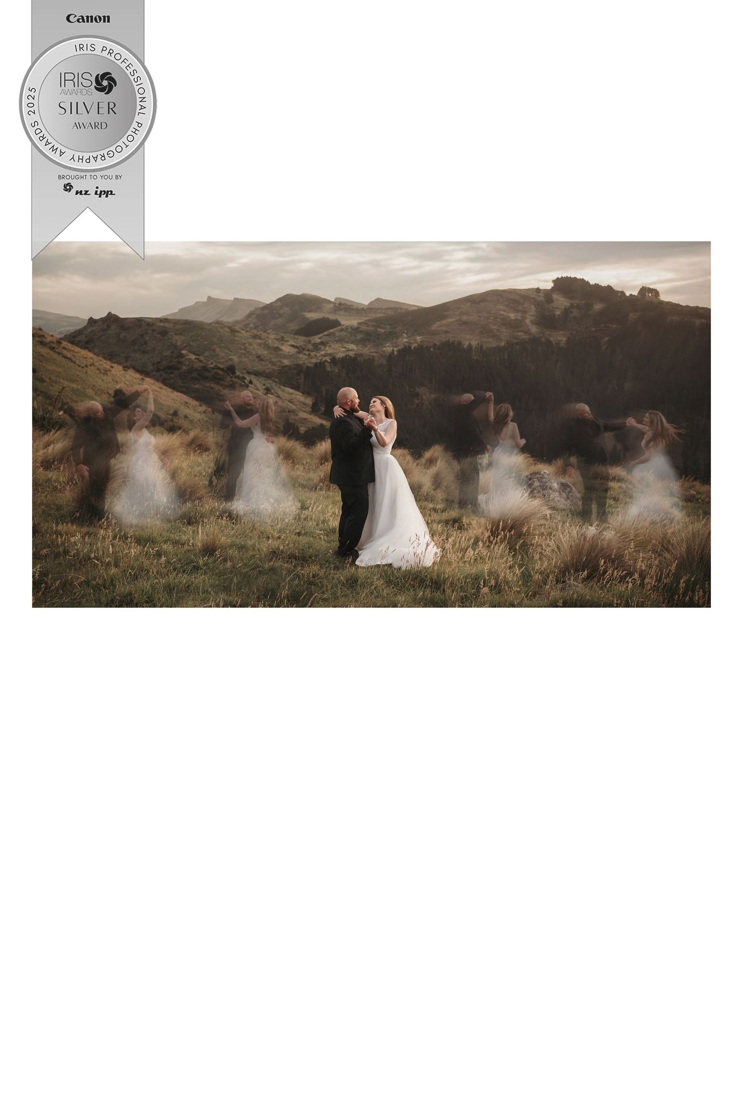 Multiple couples posing on a grassy hilltop with mountain landscapes and dramatic smoke effects.