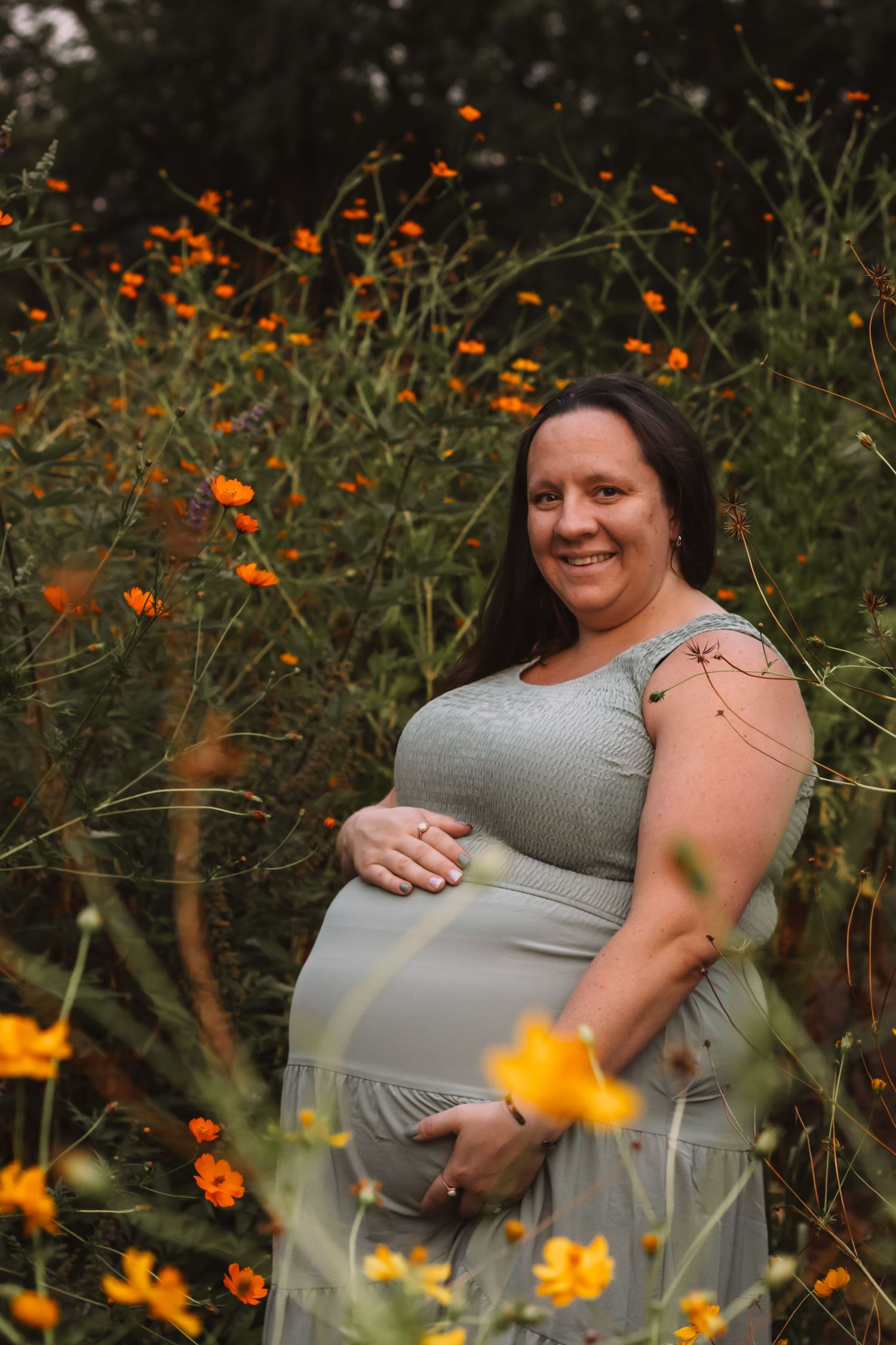 Outdoor maternity photography session with expecting mother in natural golden hour light in lewis county Washington