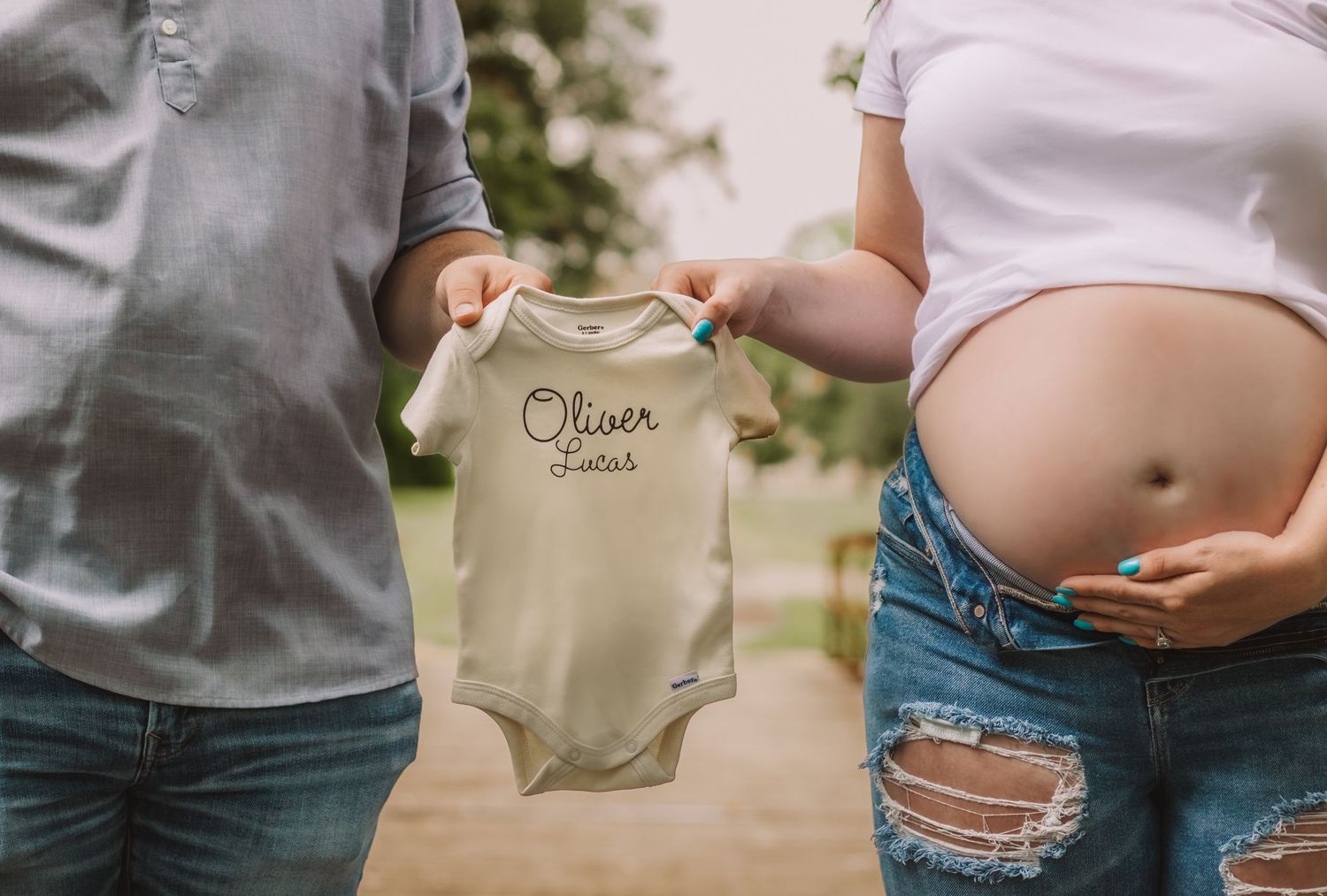 maternity session expecting mother and father holding her baby bump in lewis county Washington