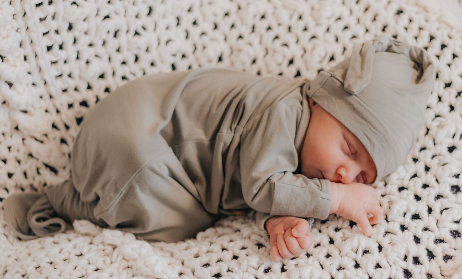 newborn baby posed in home lifestyle newborn session in lewis county Washington