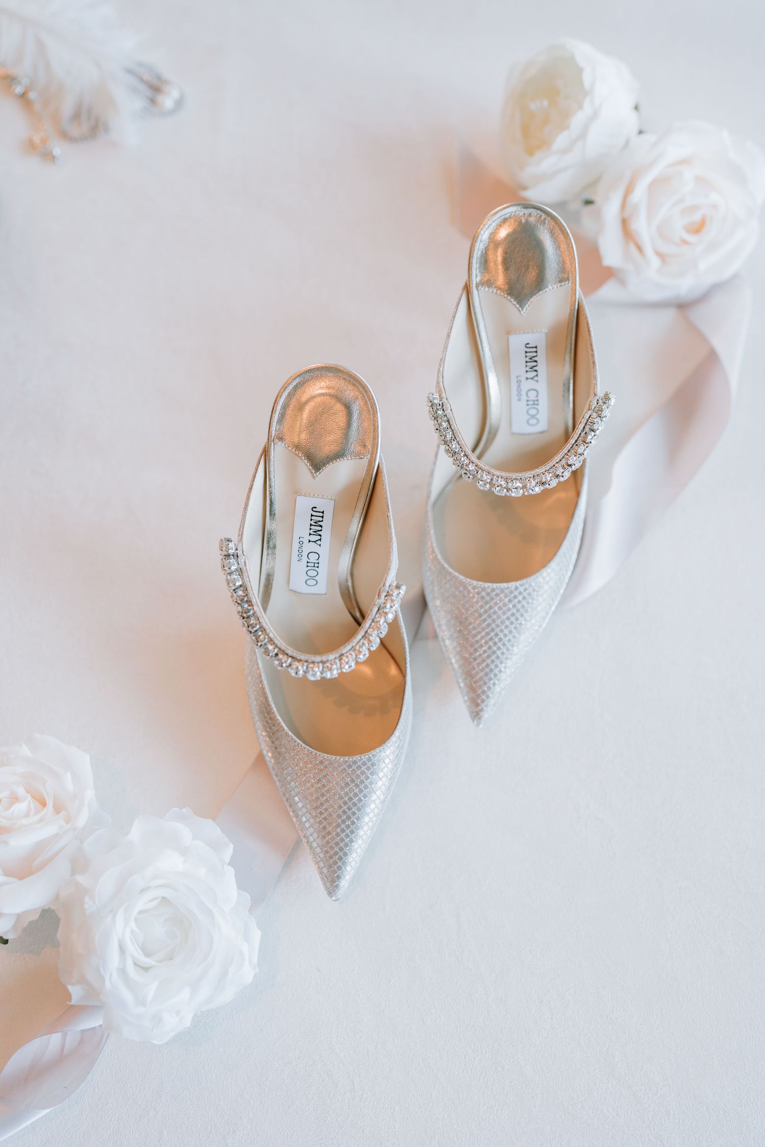 Beautiful Dallas wedding shoes on an artistic flatlay.
