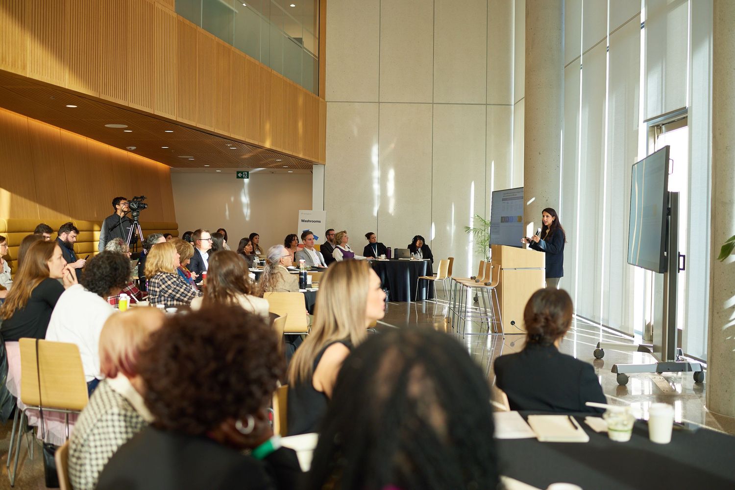 Guest speaker engaging the audience at a company seminar.
