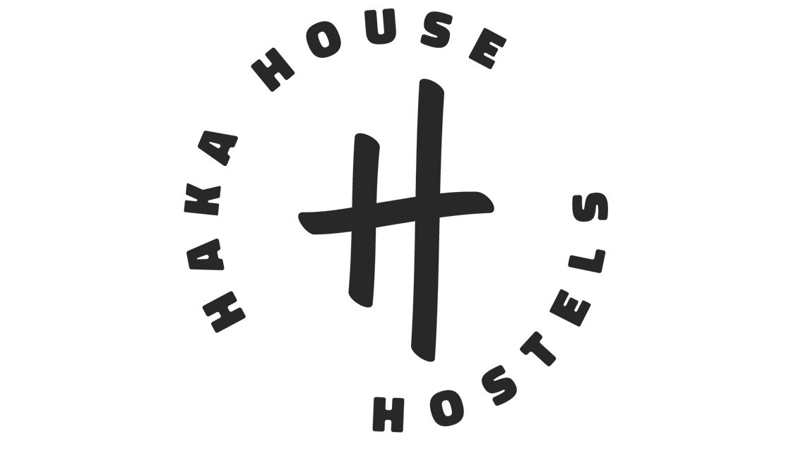 Haka House Hostels logo featuring a bold black circular design with a stylized H emblem in the center.