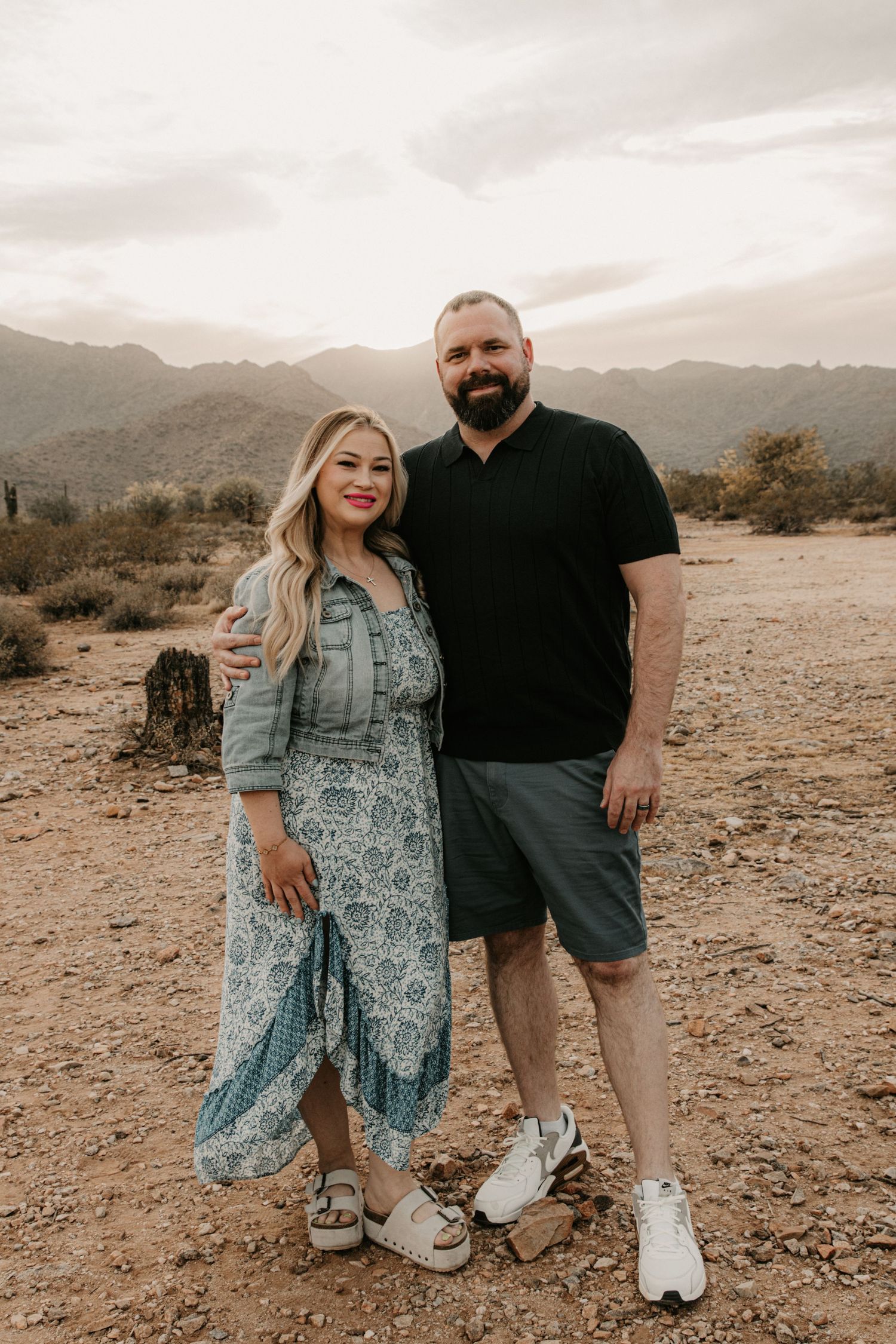 Goodyear Arizona couples photography capturing a romantic candid moment with warm tones and authentic storytelling by BOSC Photography.
