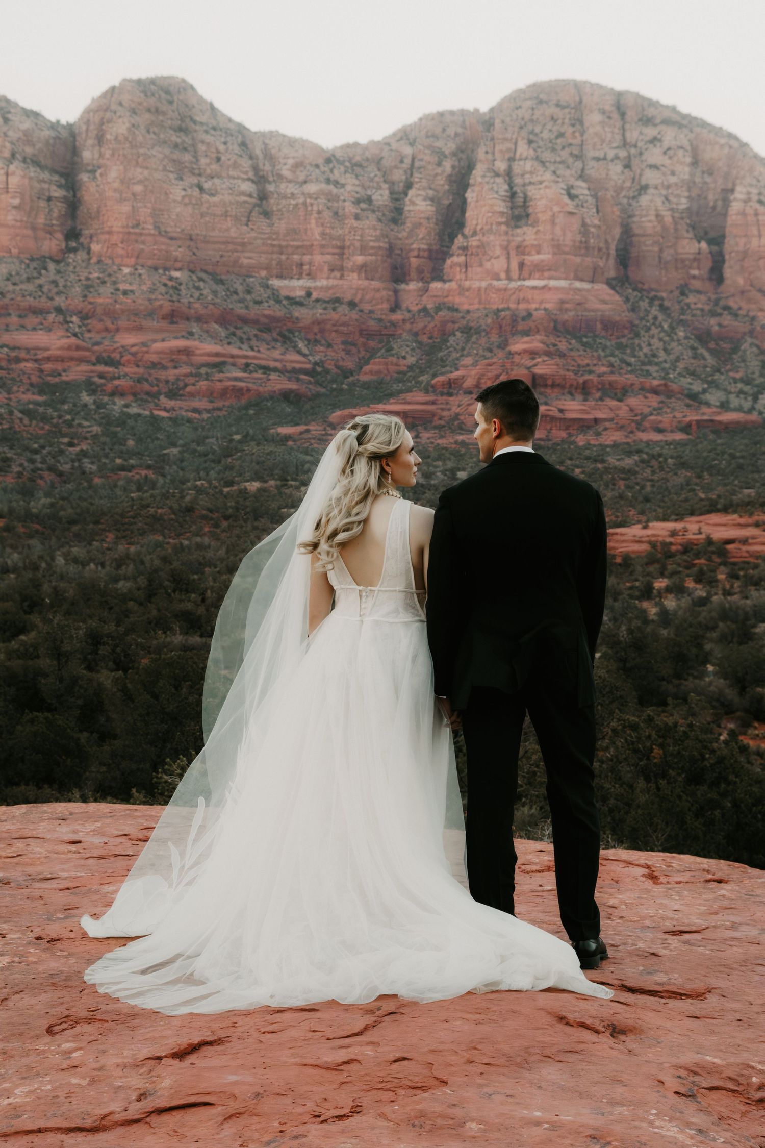 Sedona elopement photographer capturing an intimate ceremony and romantic couple portraits in the Arizona landscape.