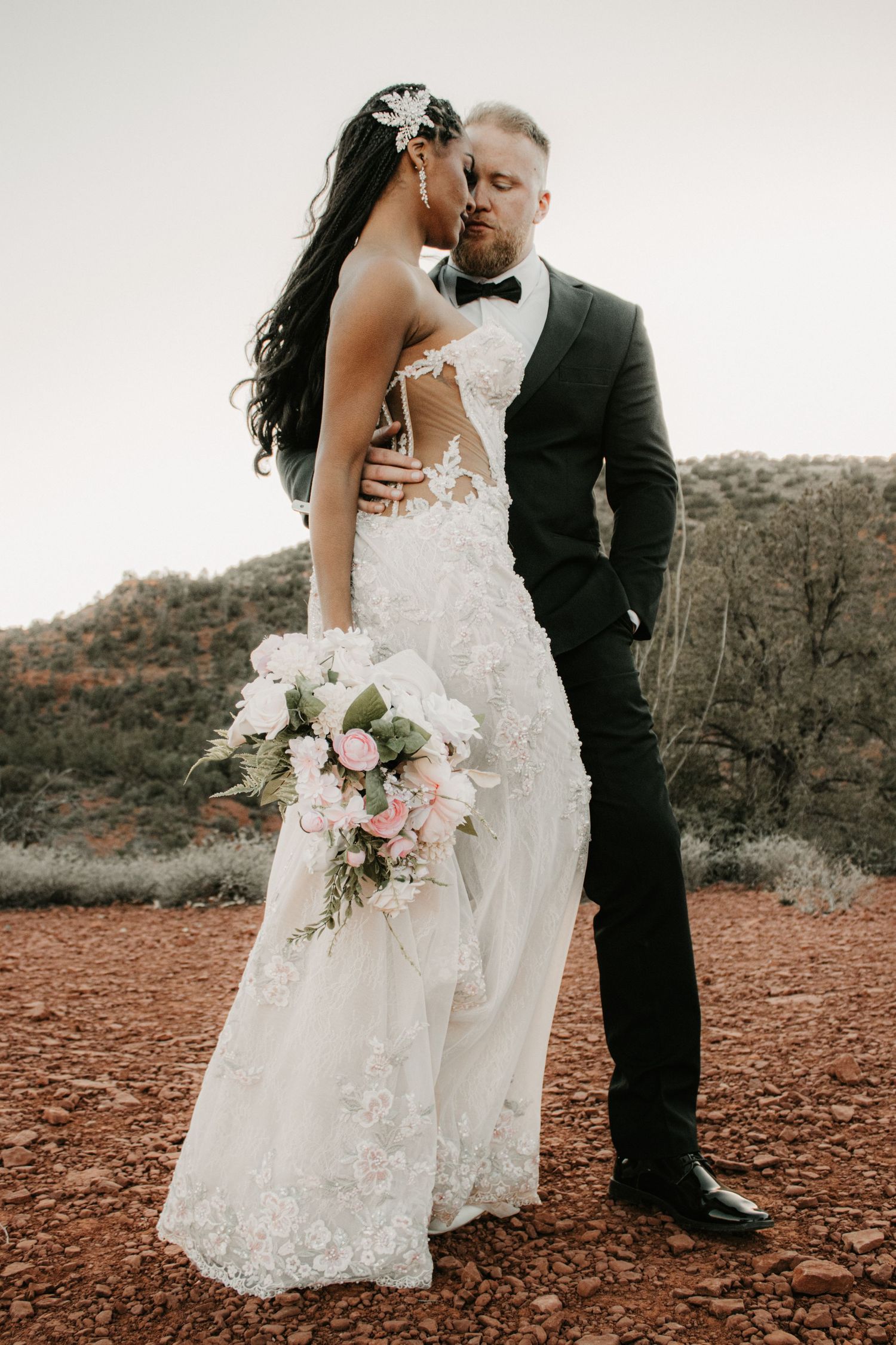 Tempe Arizona wedding photographer capturing meaningful moments between newlyweds with candid and artistic imagery.