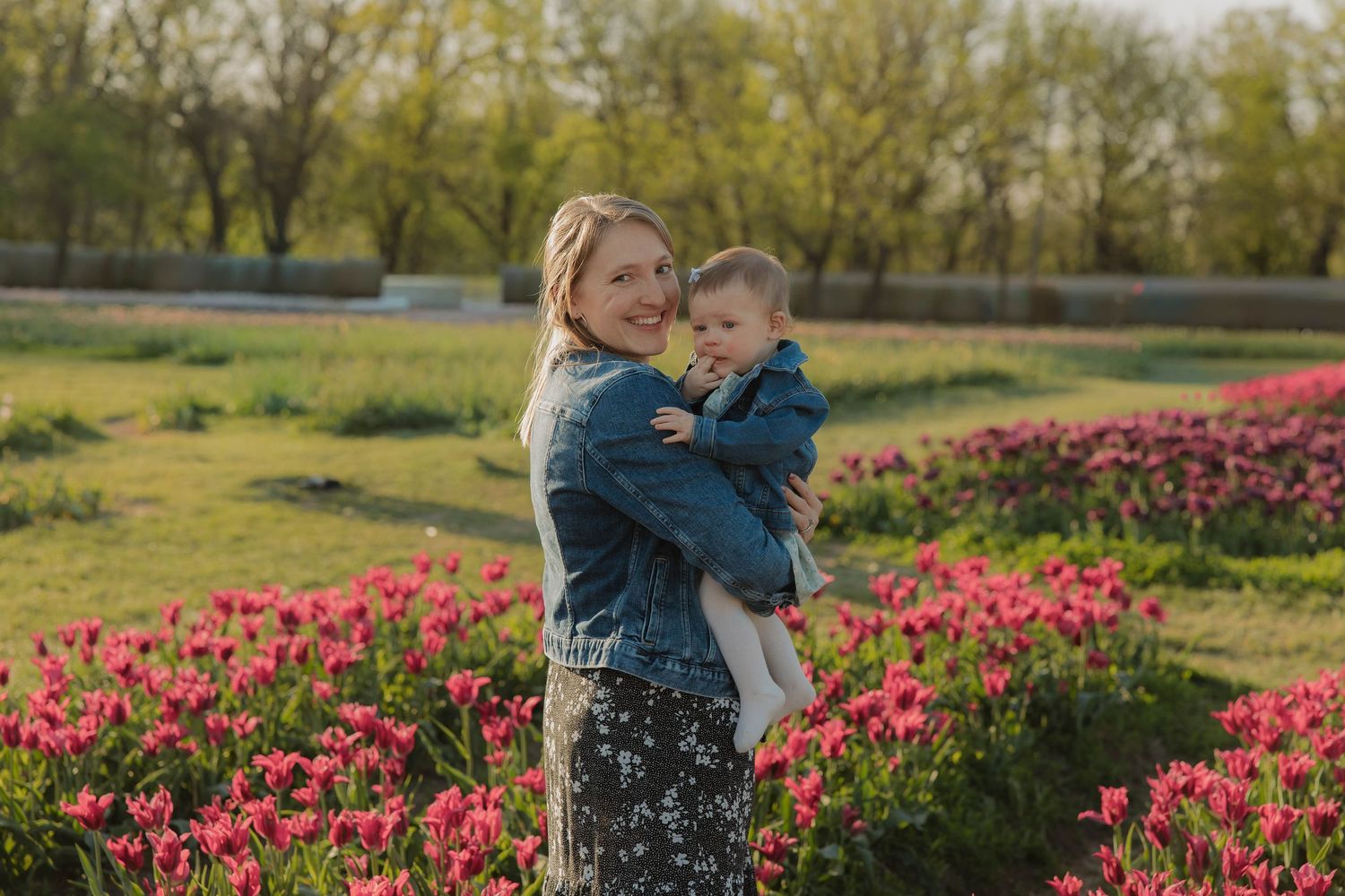 Family portrait captured in natural light at a tulip field