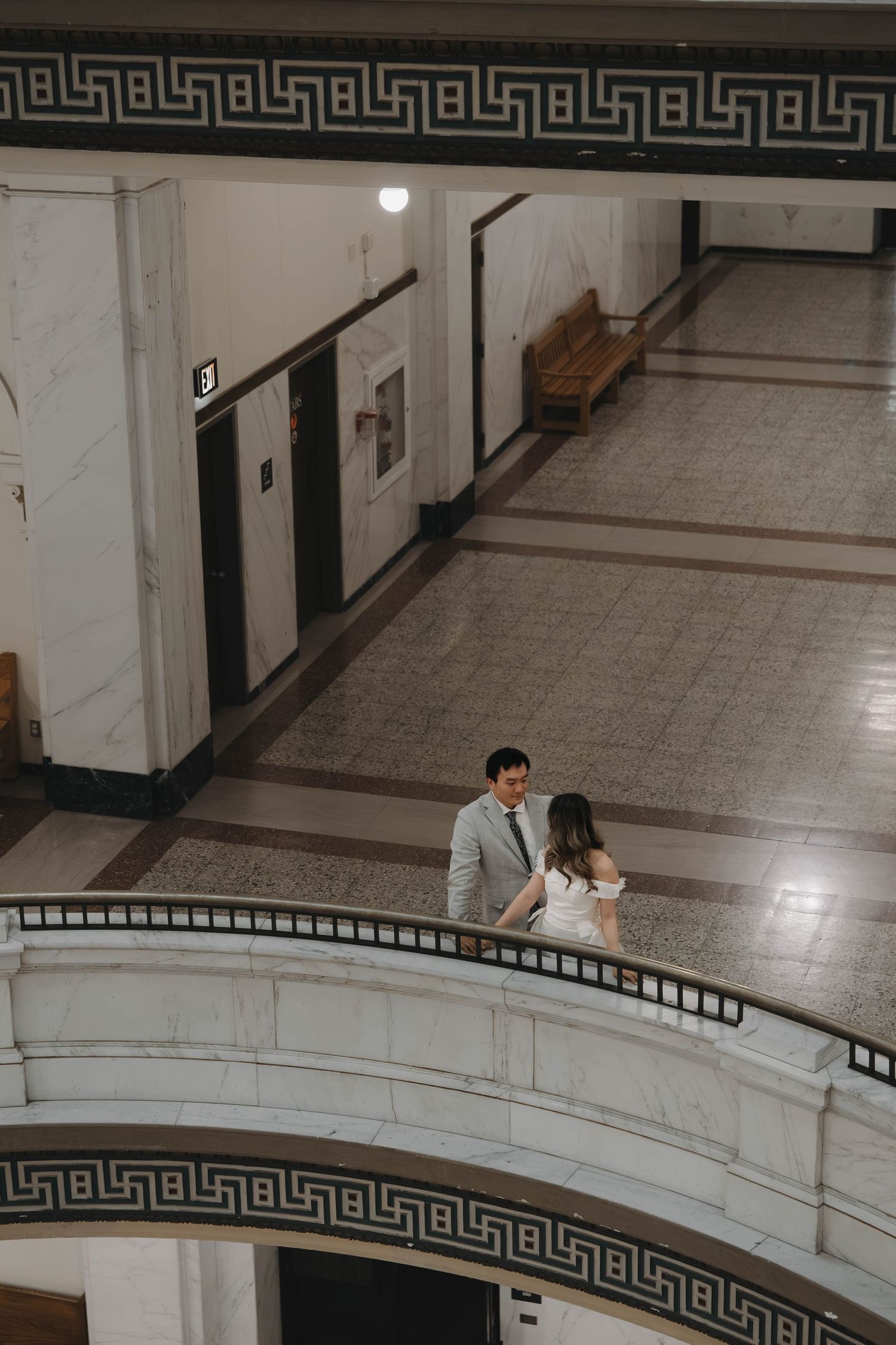 Newlyweds sharing a candid moment after their ceremony