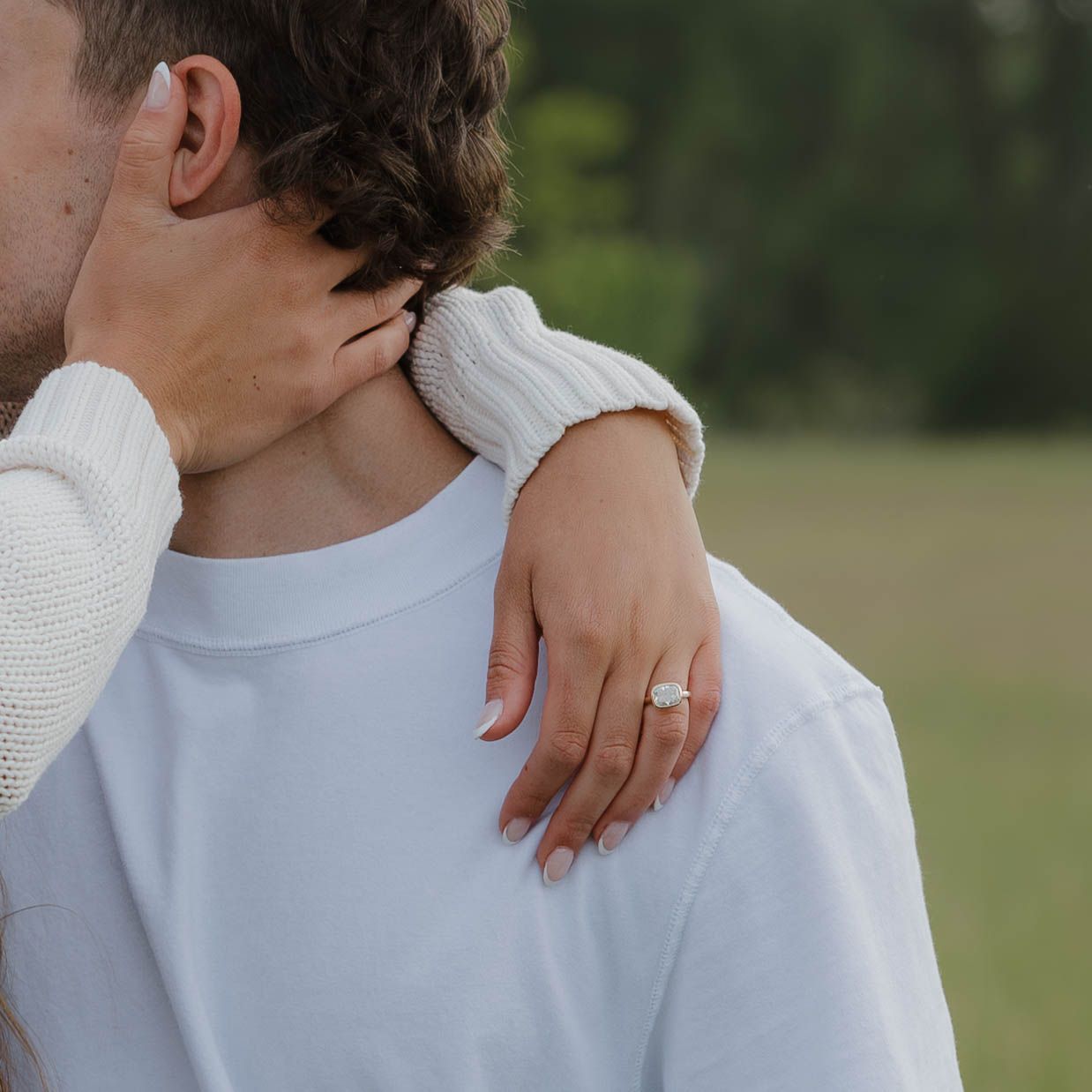 Candid moment between a couple during their portrait session