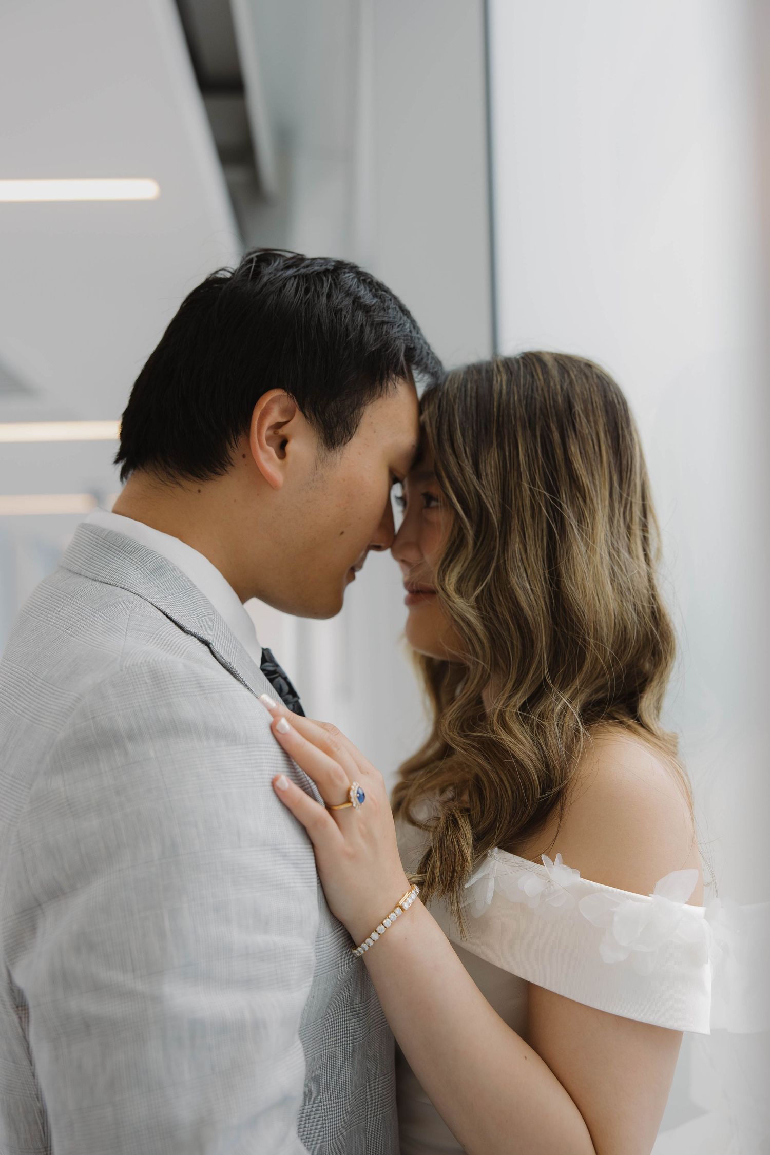 Natural portrait of the bride and groom enjoying time together before their wedding in downtown Omaha