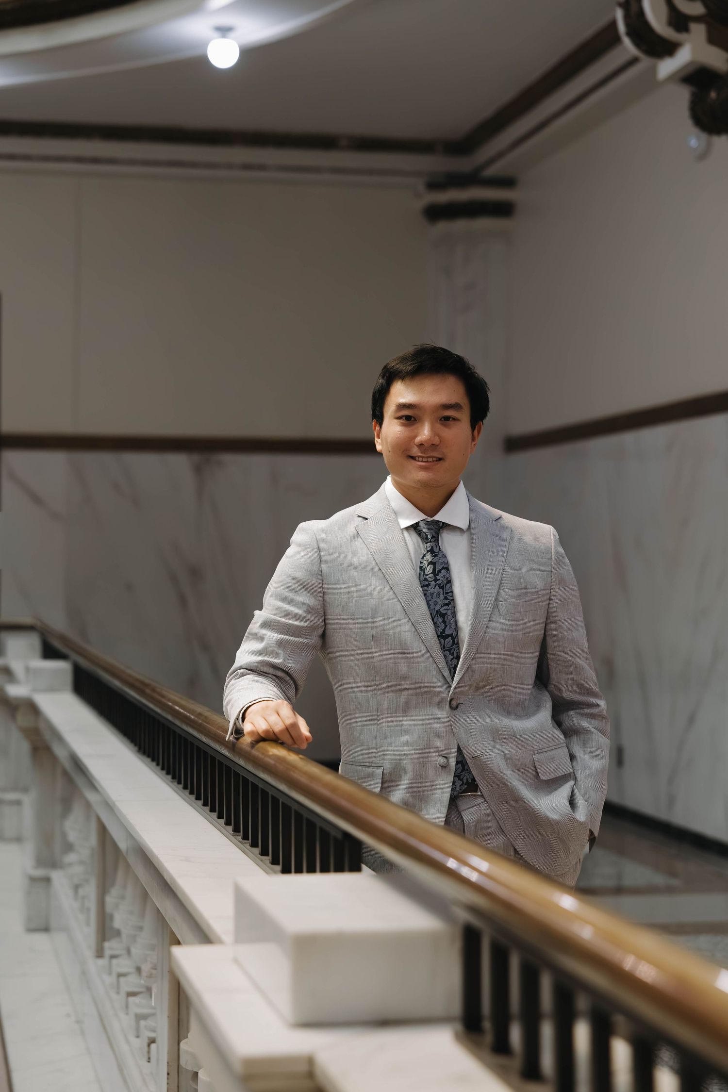 Groom smiling naturally inside the courthouse