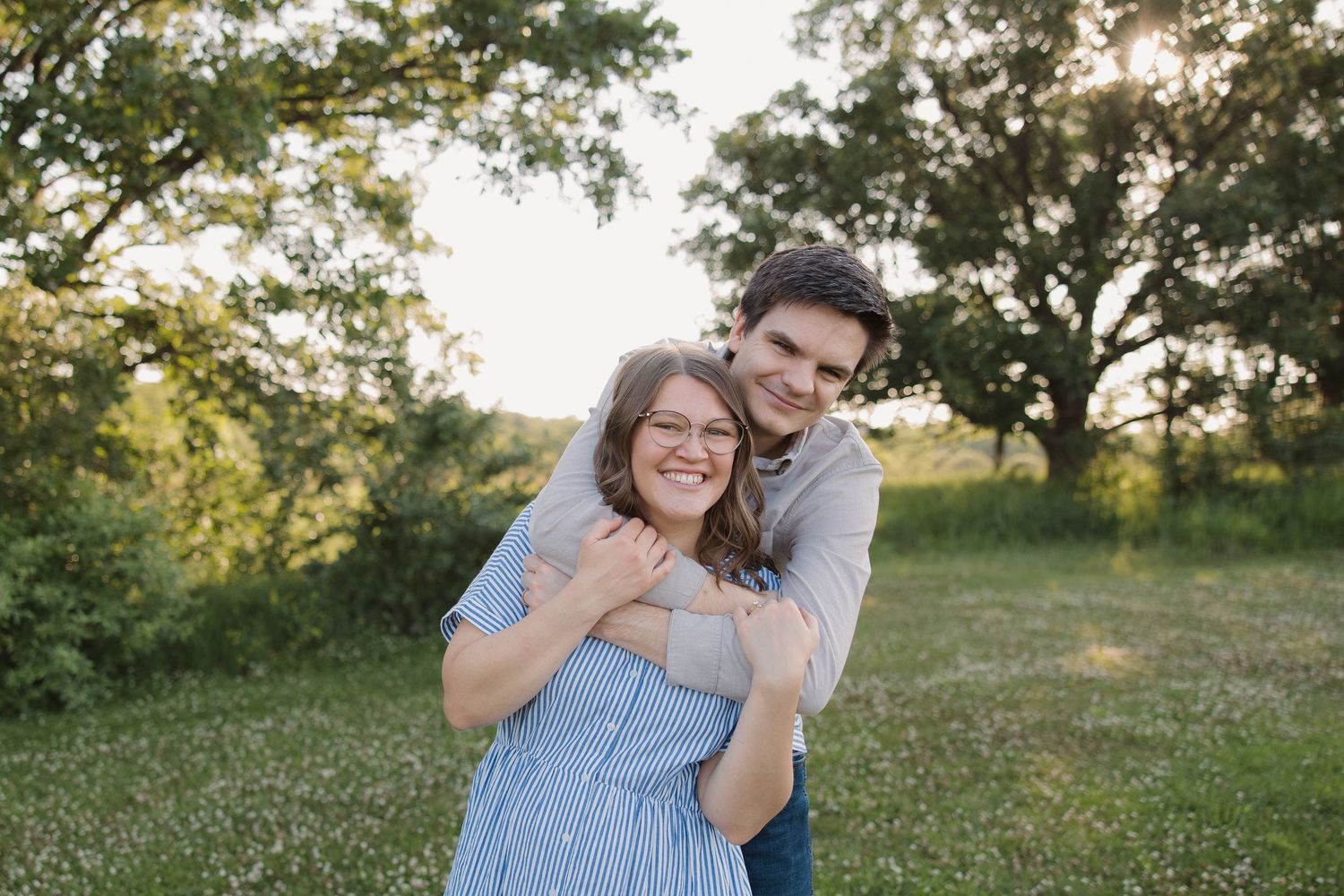 Couple embracing during a natural-light photography session