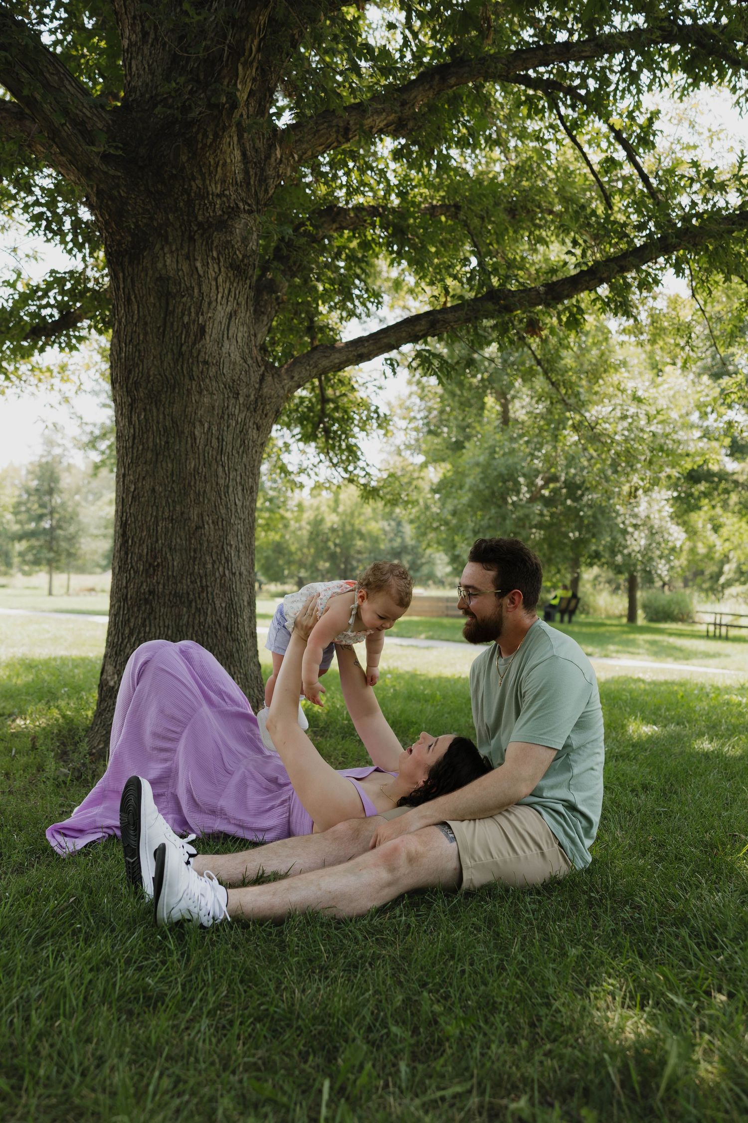 Young family enjoying an outdoor photography session