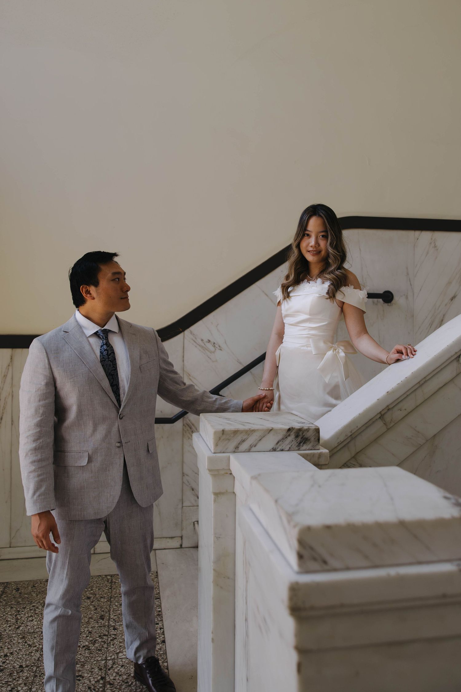 Couple enjoying a candid moment on their wedding day