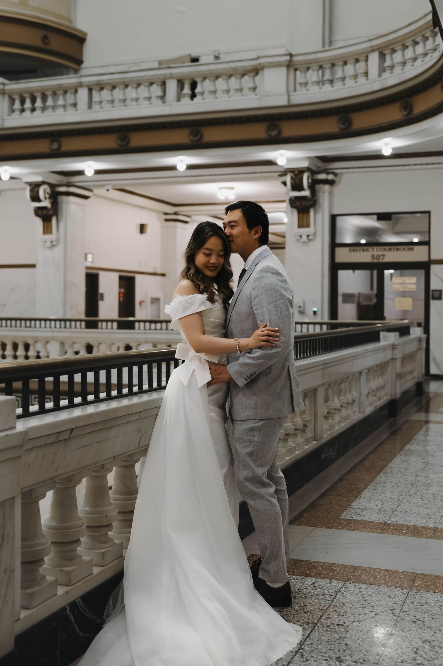 Couple exchanging vows during an intimate courthouse wedding in Omaha