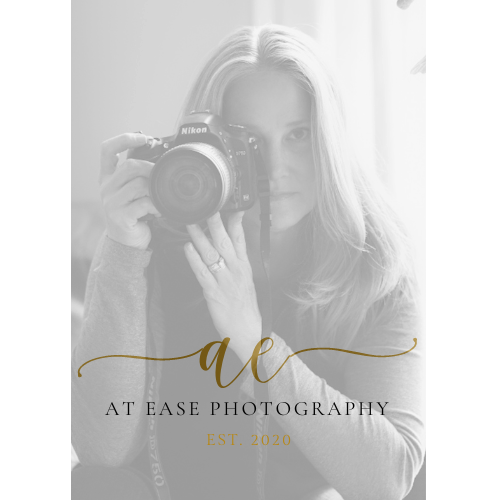 At Ease Photography logo featuring a woman holding a Nikon camera, est. 2018.
