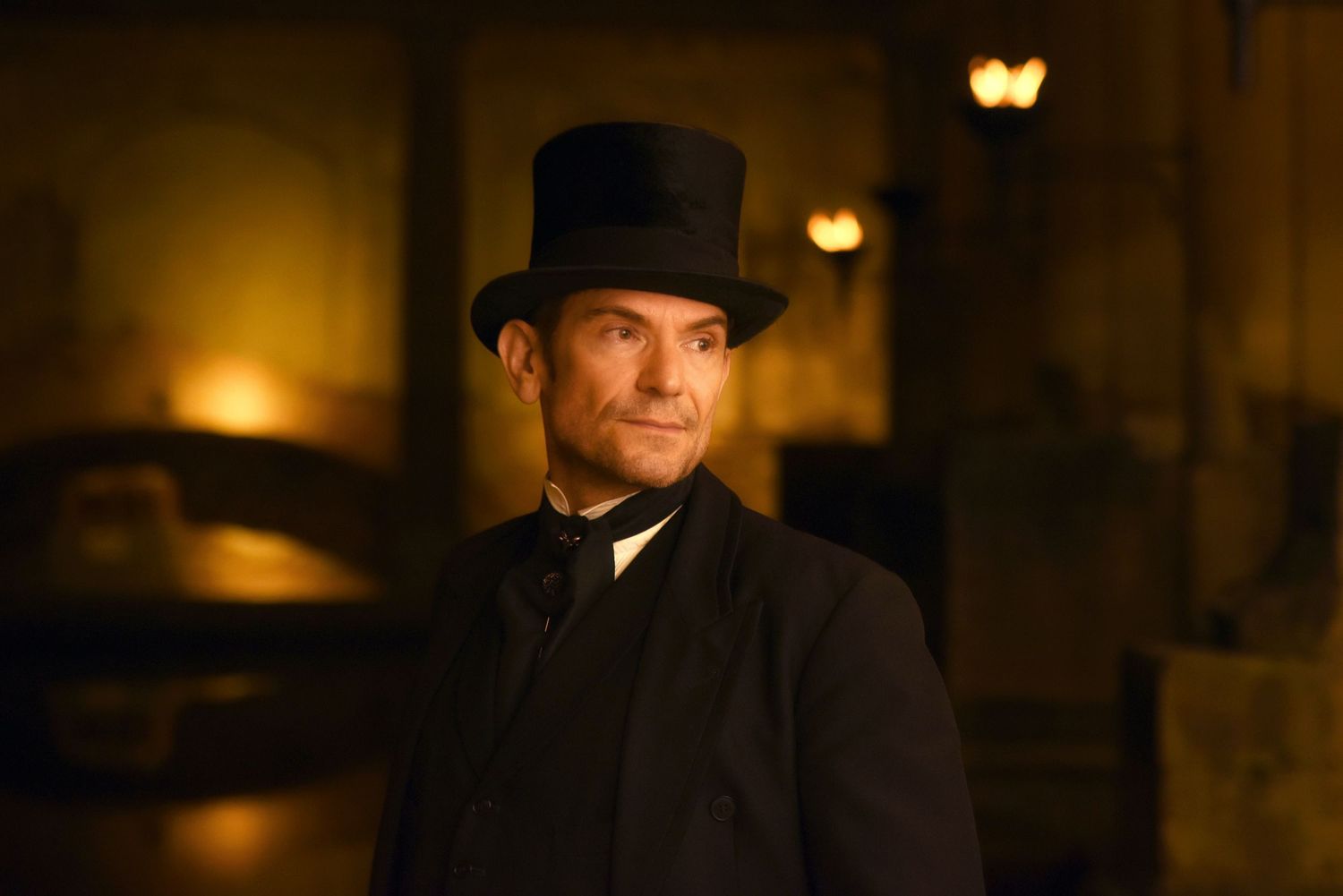 Publicity photo of Torchlight Mysteries actor for Torchlight Heritage, taken at the Roman baths