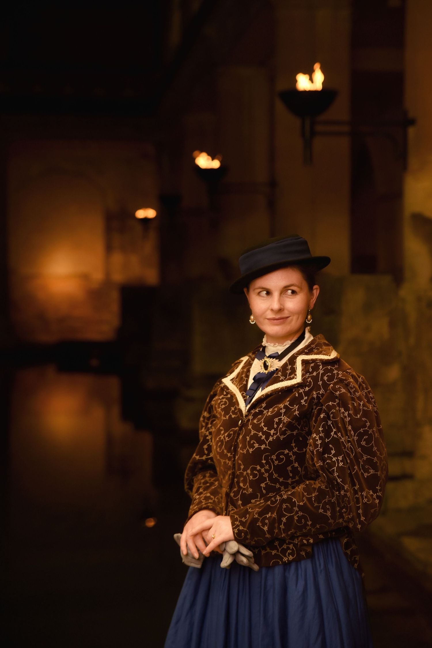 Publicity photo of Torchlight Mysteries actor for Torchlight Heritage, taken at the Roman baths