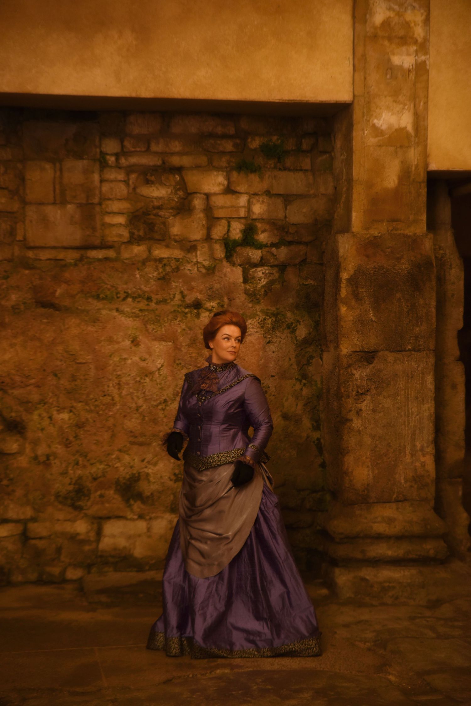 Publicity photo of Torchlight Mysteries actor for Torchlight Heritage, taken at the Roman baths