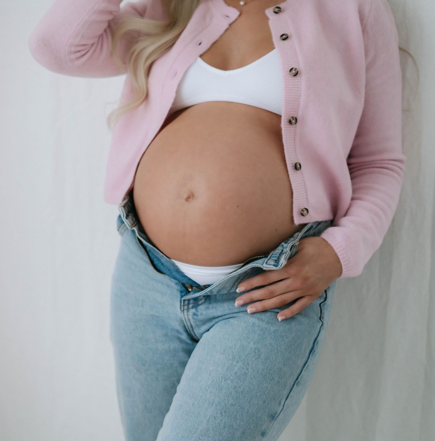 Elegant maternity shoot styled by April Harvey Photography in Torquay Devon