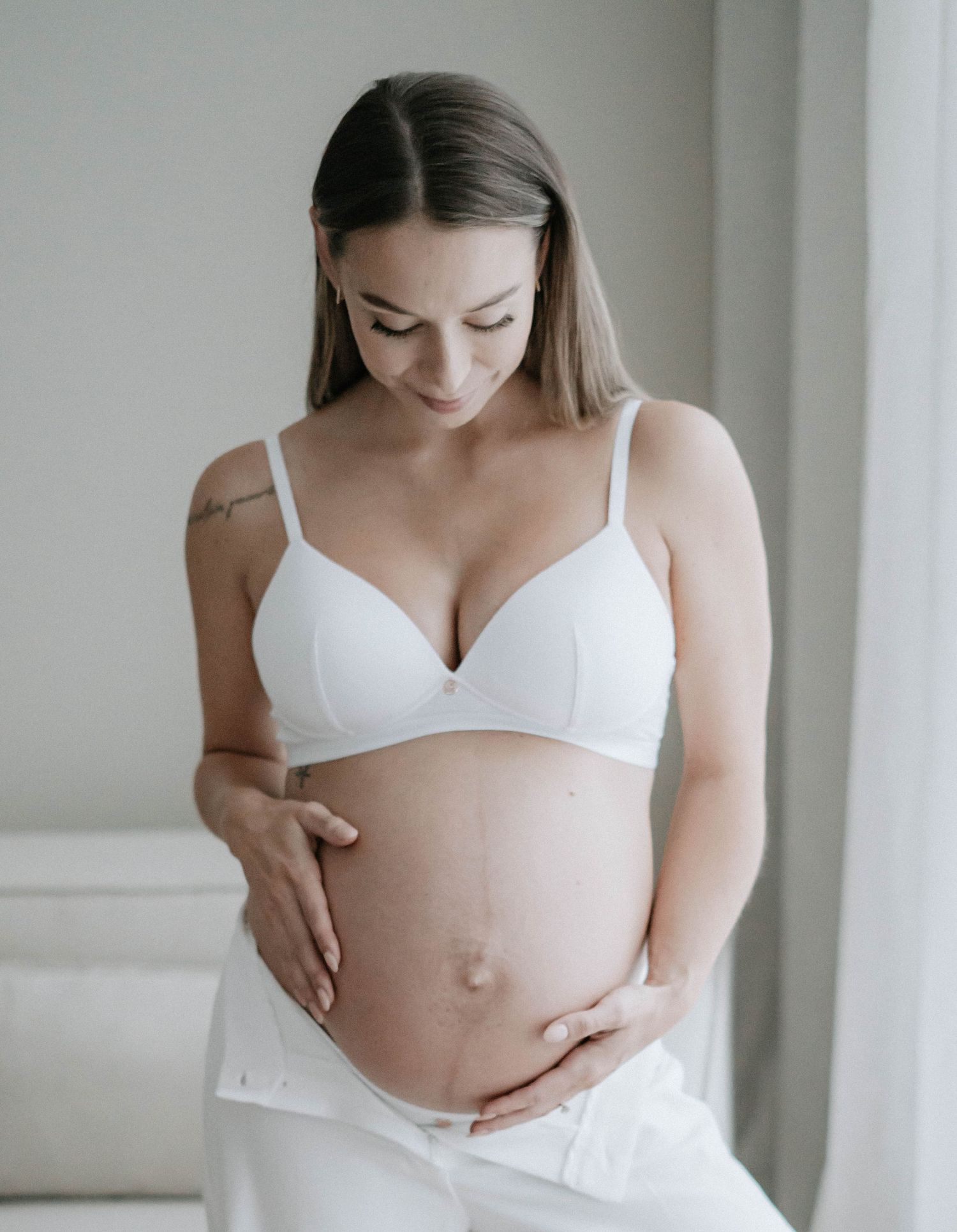 Elegant maternity shoot styled by April Harvey Photography in Torquay Devon