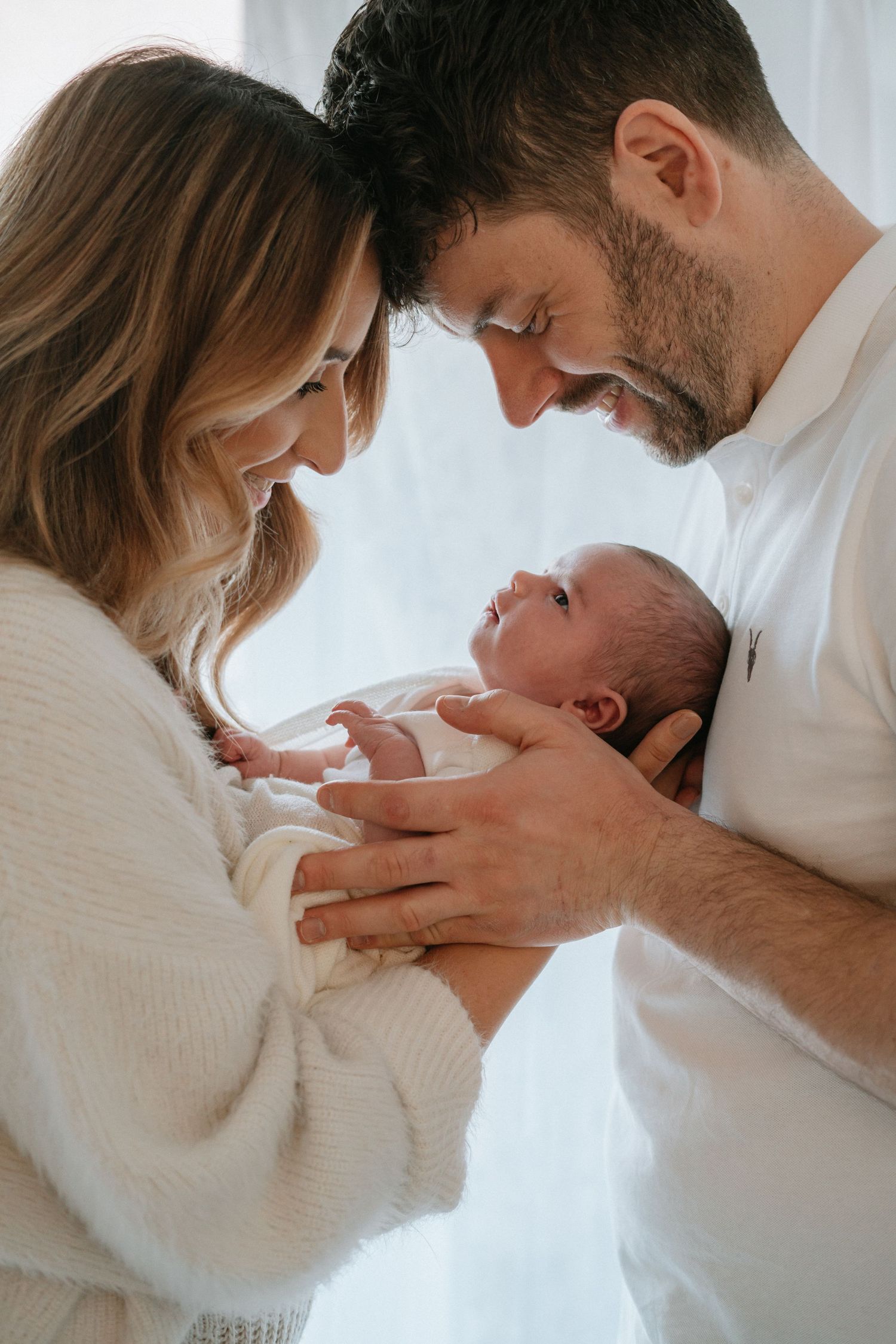 capturing devon parents with there newborn baby