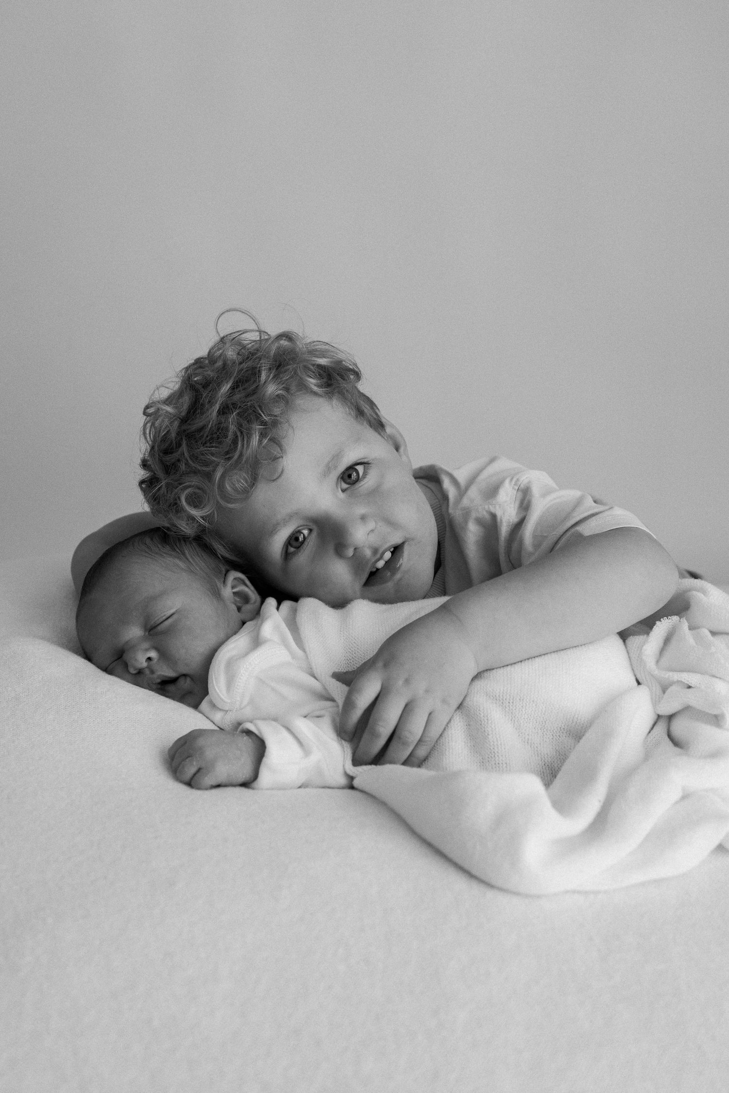 Newborn with sibling shoot in Torbay at April Harvey Photography studio in Devon