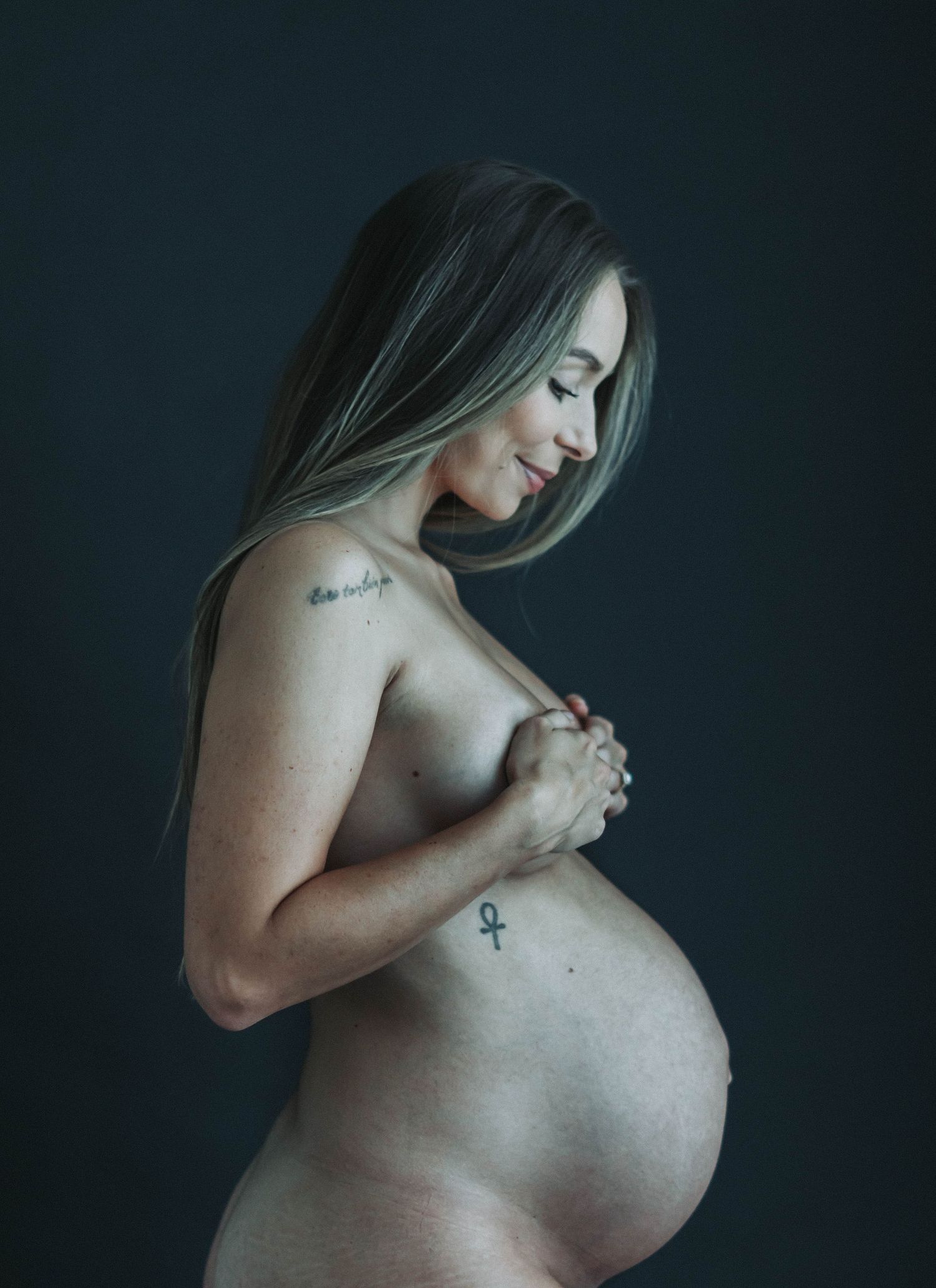 Elegant maternity shoot styled by April Harvey Photography in Torquay Devon