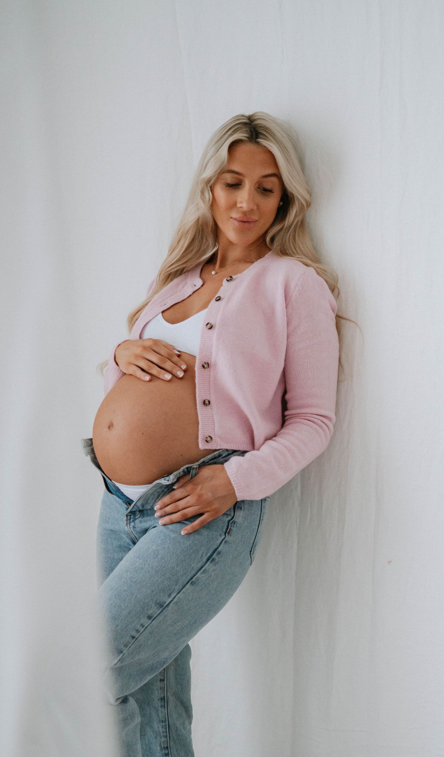 Elegant maternity shoot styled by April Harvey Photography in Torquay Devon