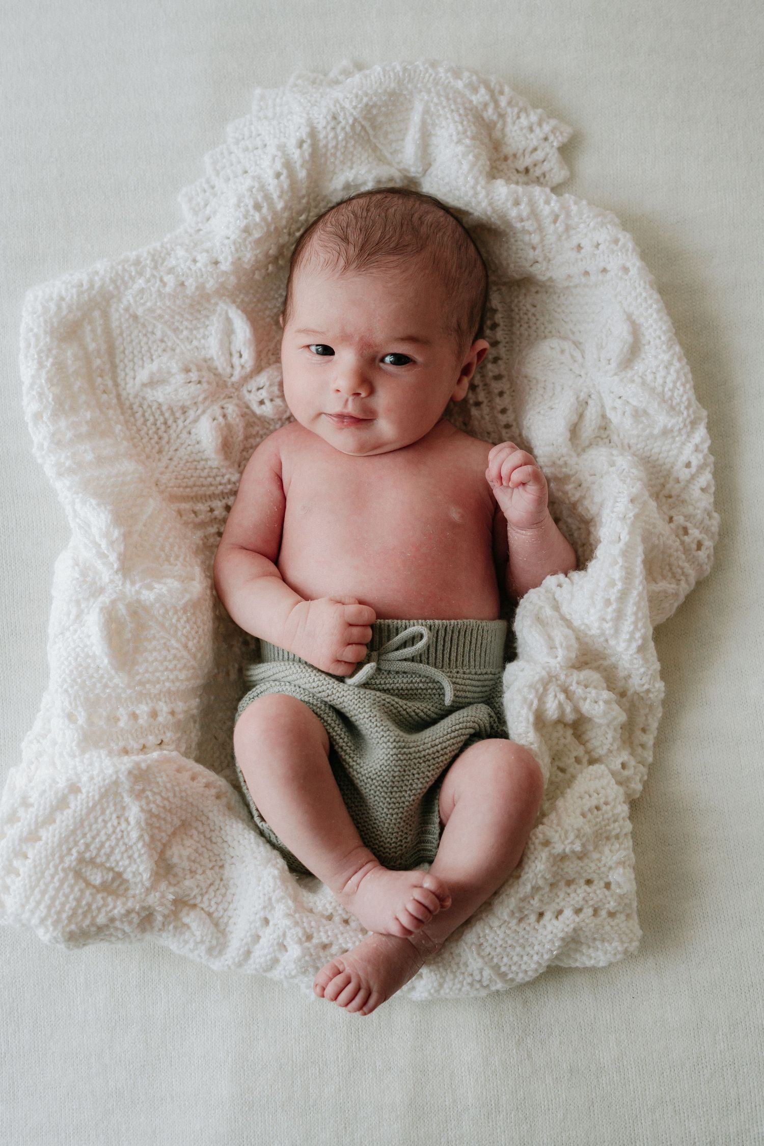 capturing newborn babies from 5-15 days old sharing the memories forever