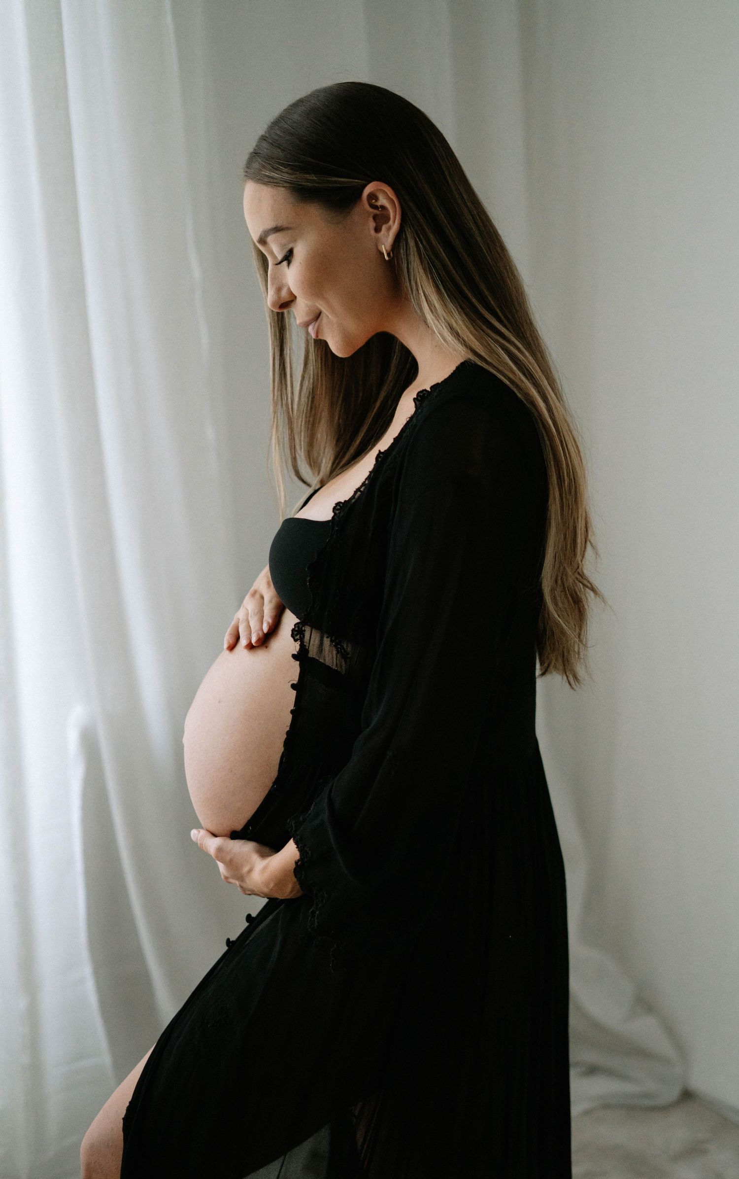 Elegant maternity shoot styled by April Harvey Photography in Torquay Devon