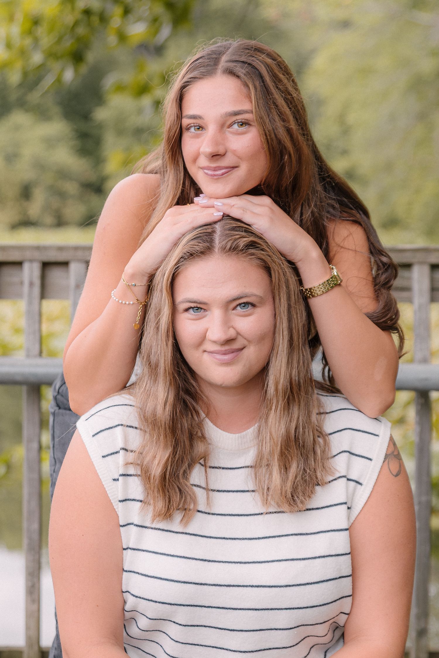 Family portrait photoshoot for 2 sisters at the Historic Smithville Park, Eastampton, NJ. Lush green backdrop on a summer afternoon.