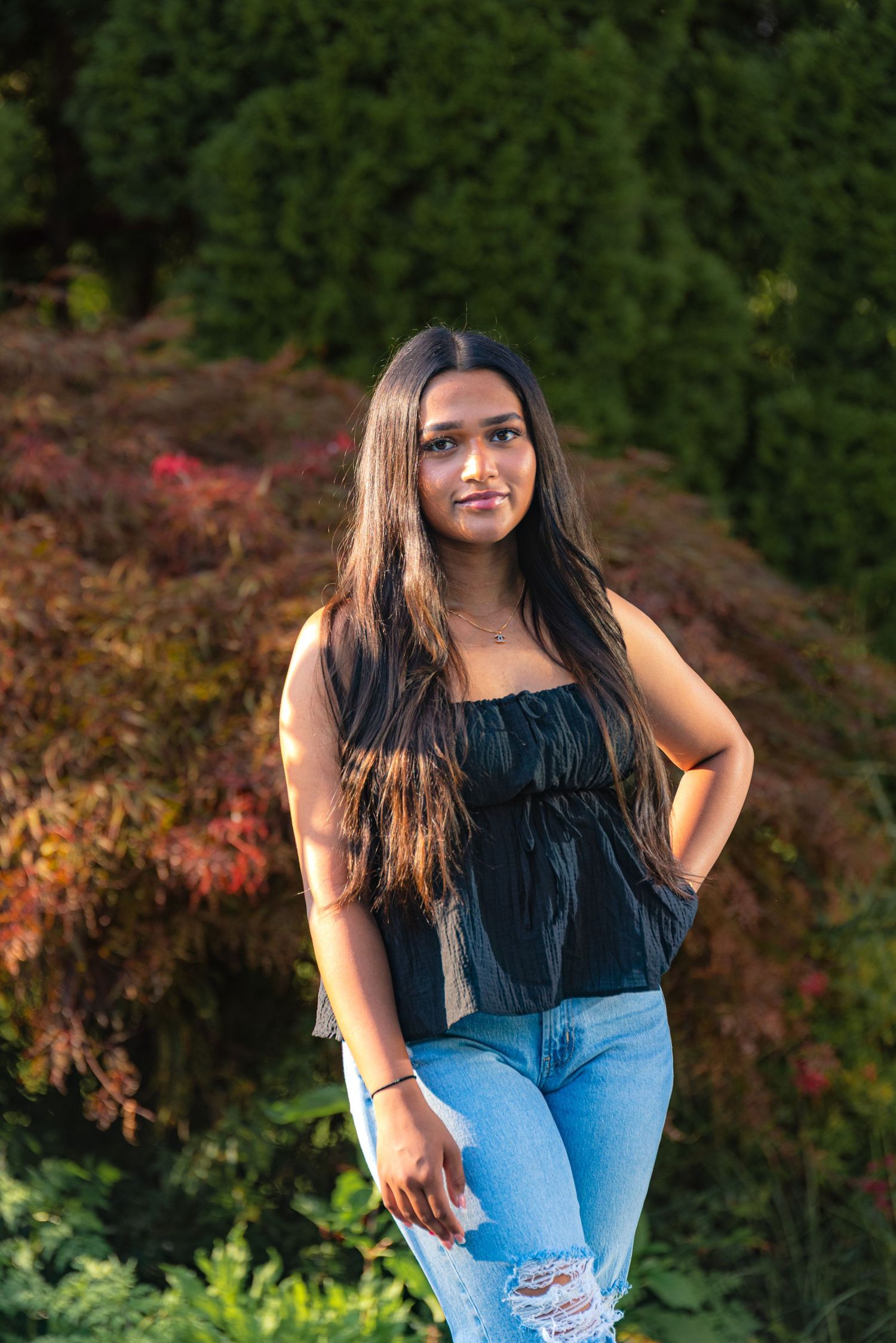 High school senior portraits photoshoot. Backyard photos by the side of pool in Mount Laurel, NJ.