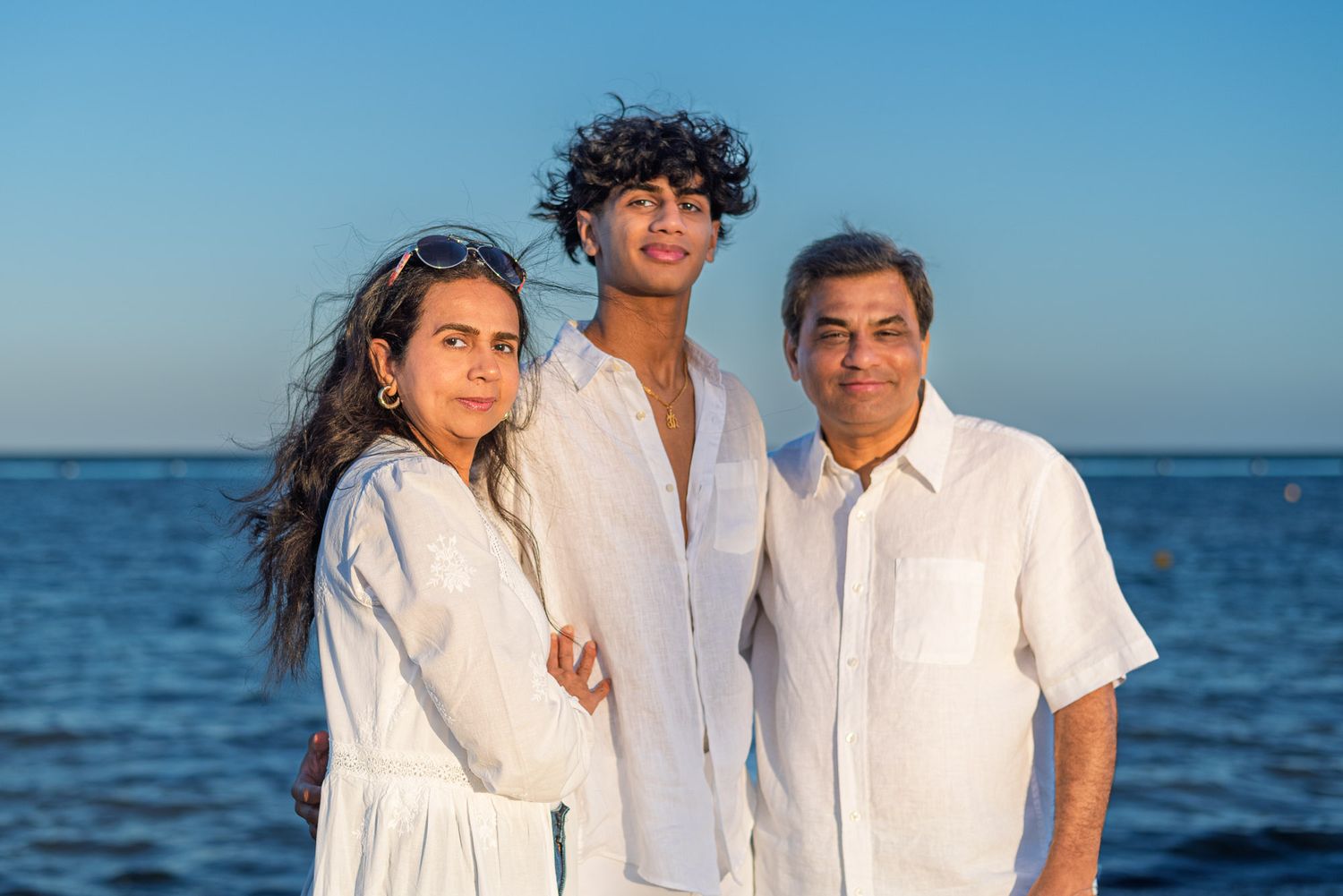 Family portrait on the beach at sunset. Jersey shore, NJ