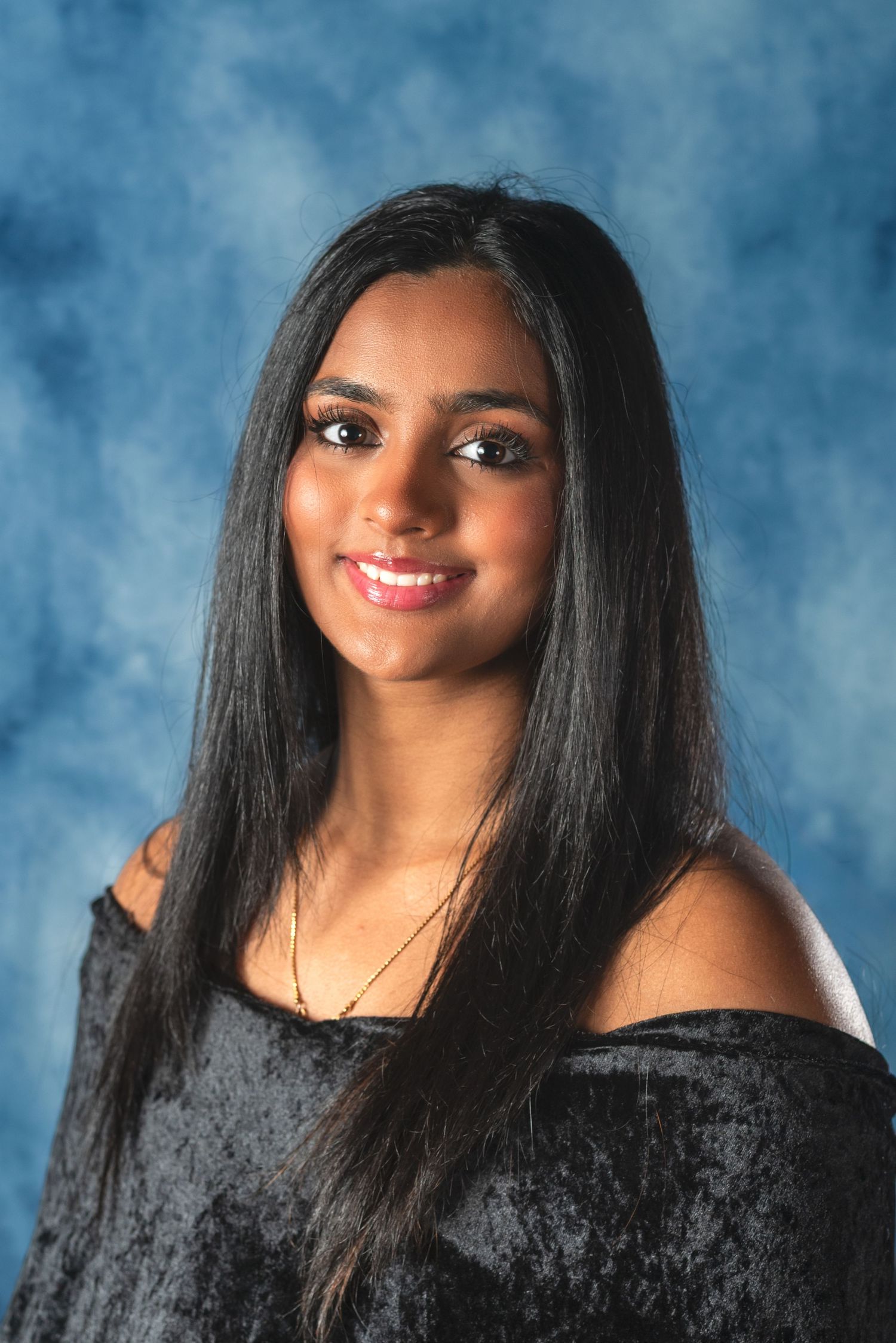 High school senior yearbook portraits. Cap and gown, senior headshots, lifestyle portraits. In-home studio photoshoot in Mount Laurel, NJ.