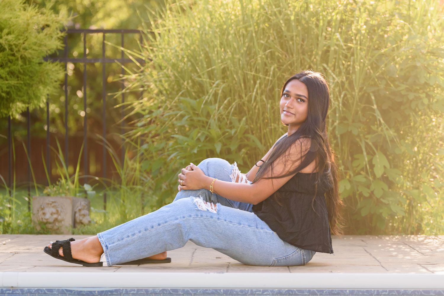 High school senior portraits photoshoot. Backyard photos by the side of pool in Mount Laurel, NJ.