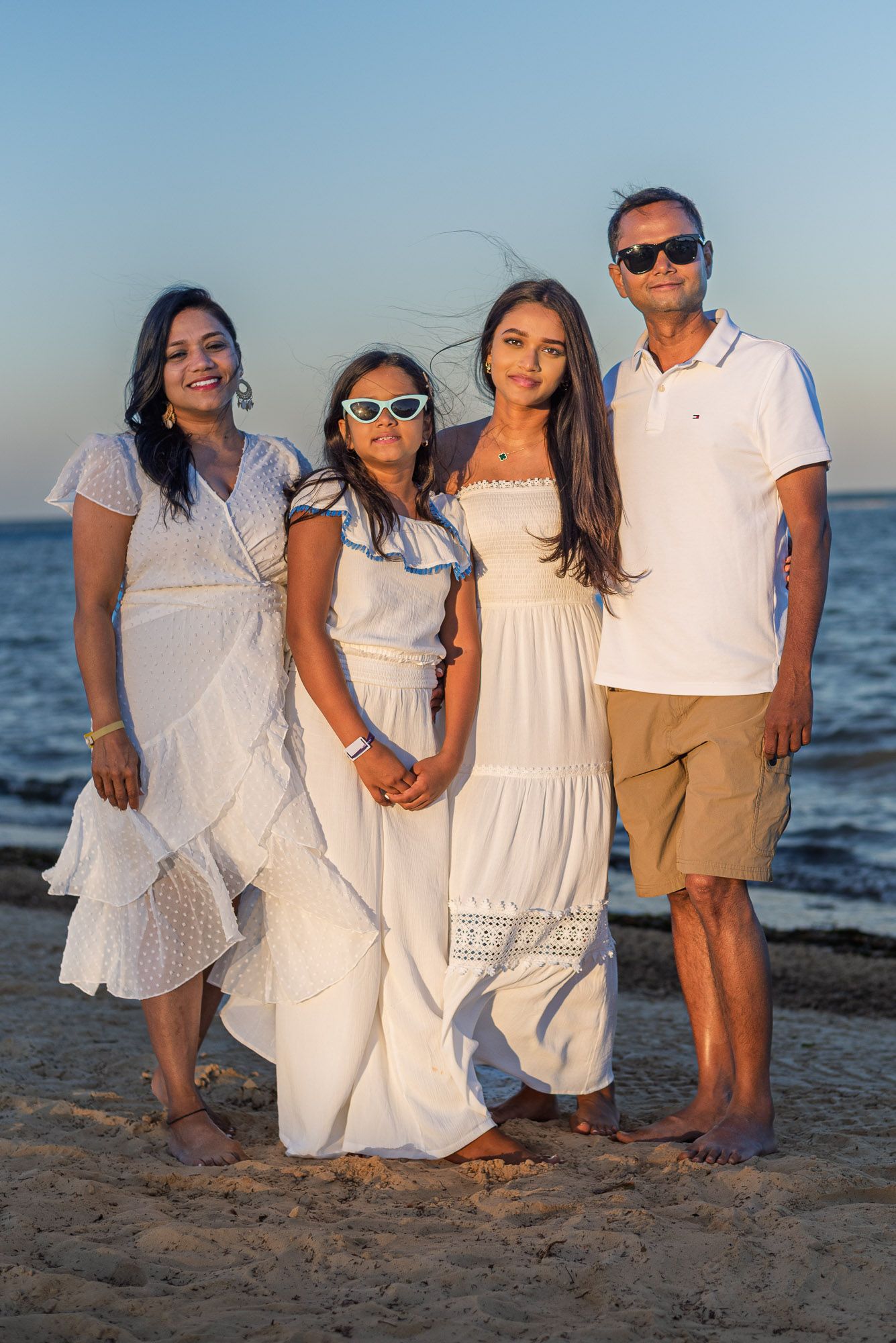 Family portrait on the beach at sunset. Jersey shore, NJ