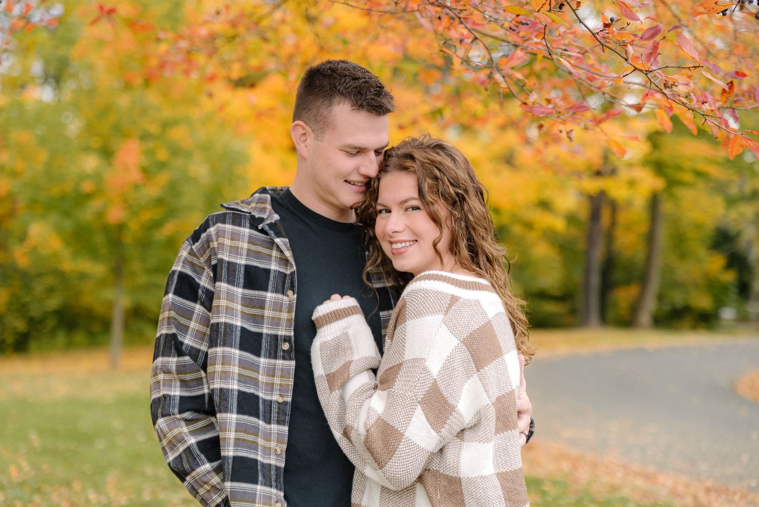 Wedding Anniversary photoshoot of a beautiful couple. Fall photos. Strawbridge Lake Park, Moorestown, NJ.