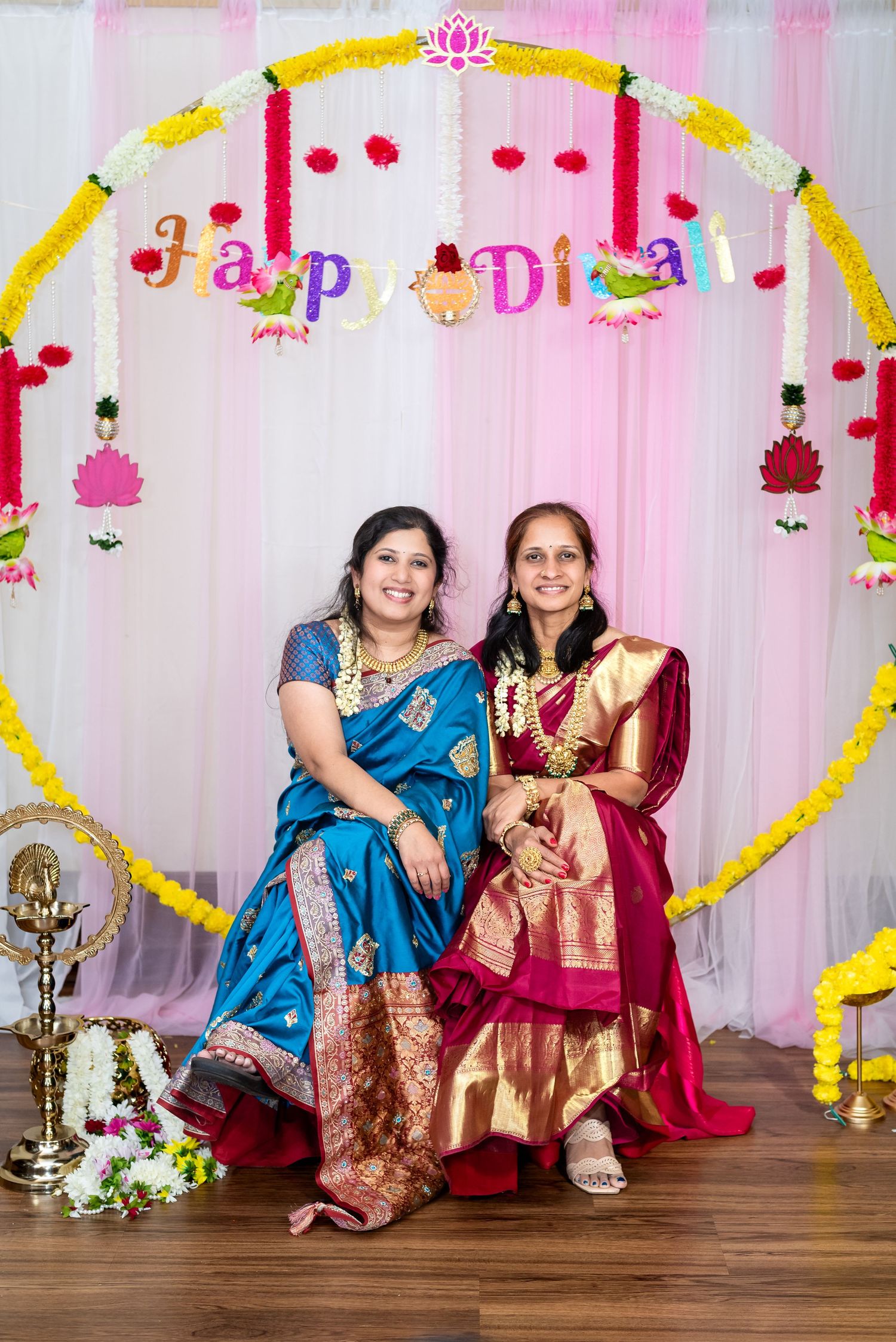 Decorative arch with pink stripes and yellow accents for a festive celebration.