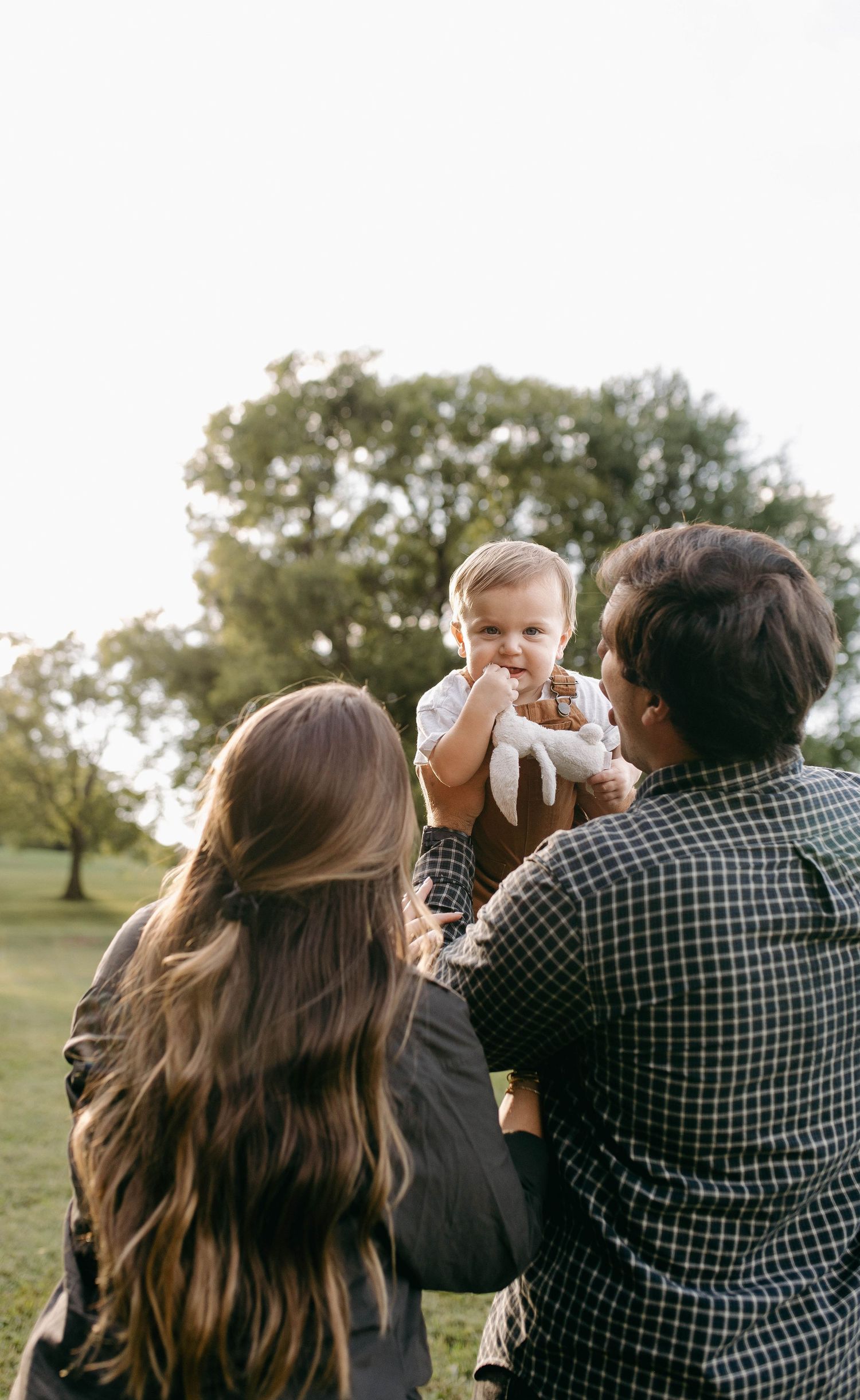 A family posing during a family photo shoot in Franklin, TN