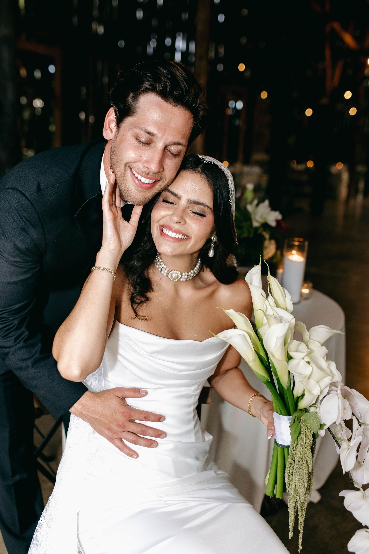 A bride and groom posing for their luxury photographer during their wedding day in Nashville, TN