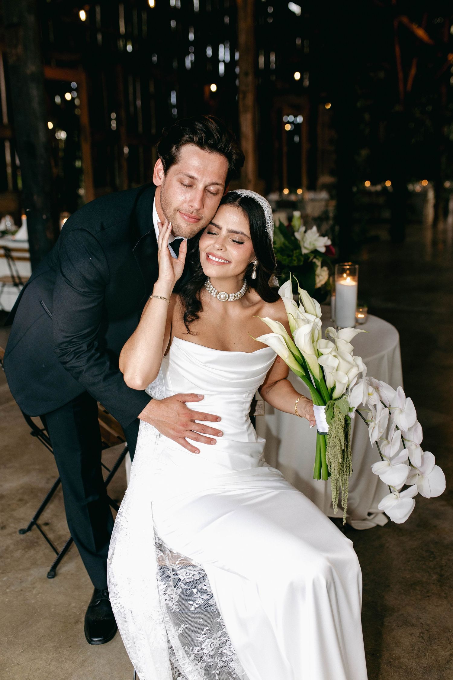 A bride and groom posing for their luxury photographer during their wedding day in Nashville, TN