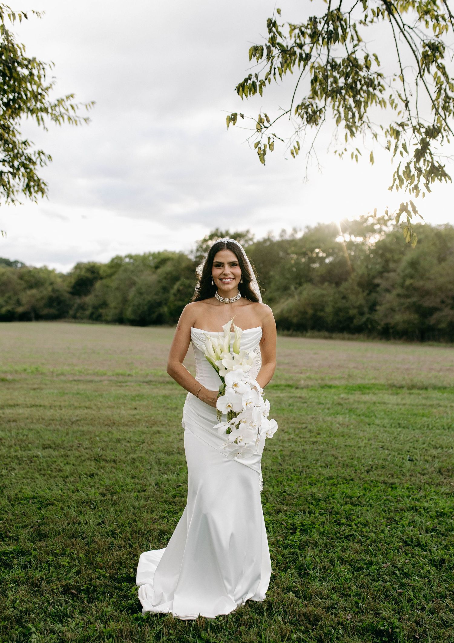 A bride and groom posing for their luxury photographer during their wedding day in Nashville, TN