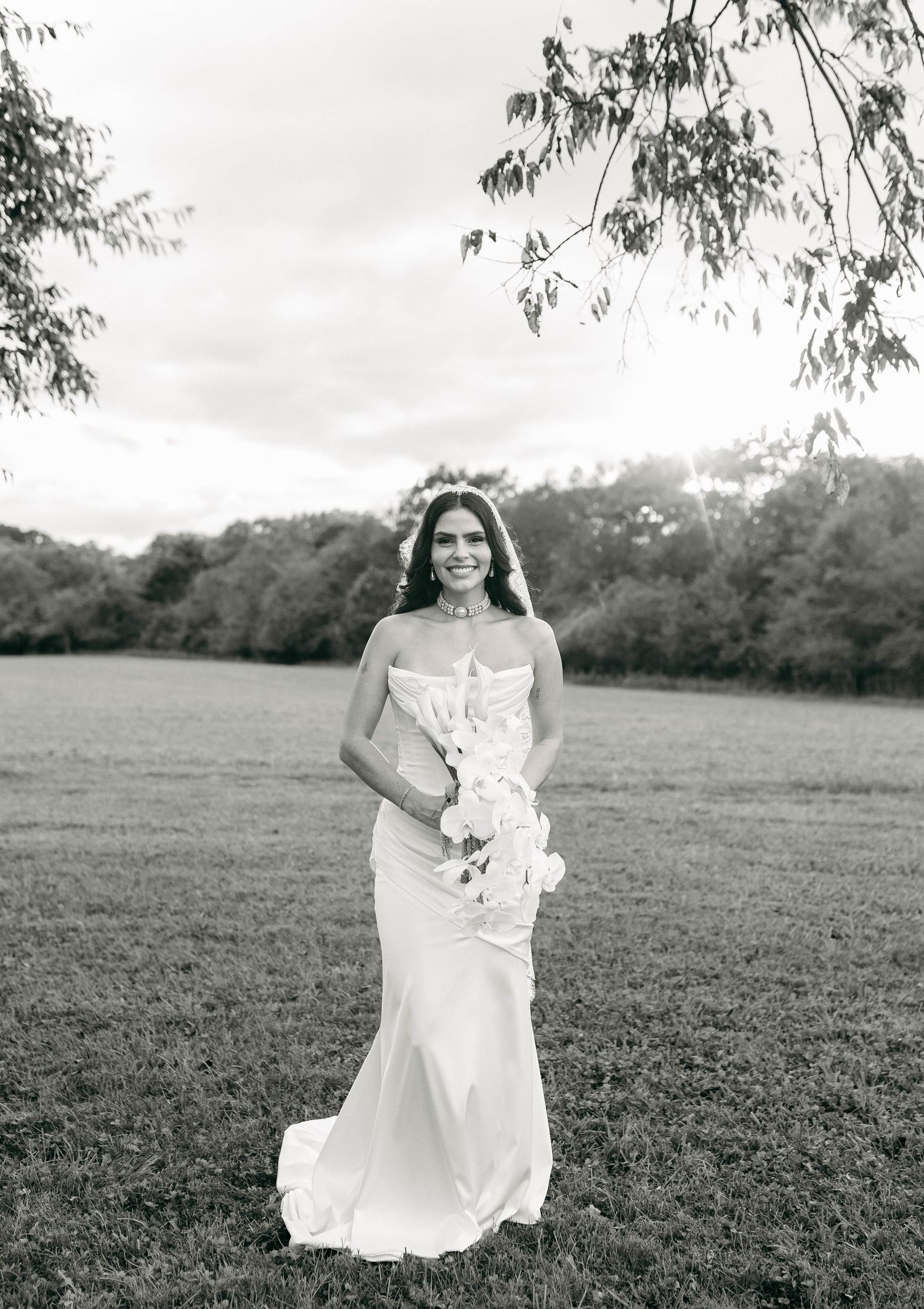 A bride and groom posing for their luxury photographer during their wedding day in Nashville, TN
