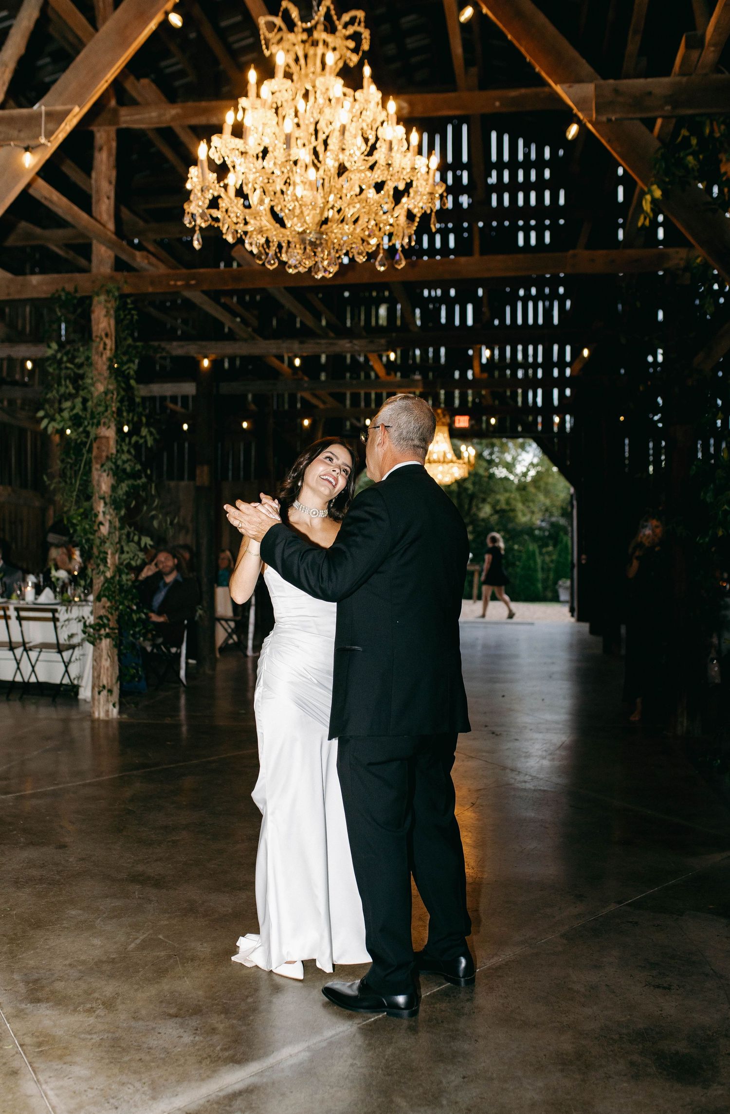 A dad dancing with his daughter, the bride, in Nashville, TN