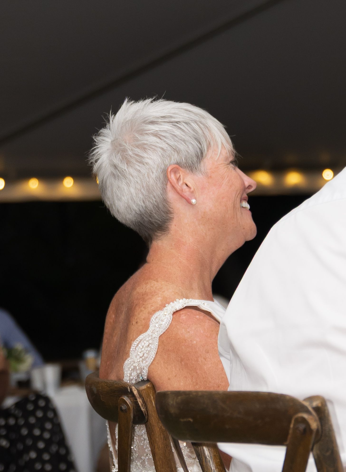A sequence of photos shows someone with white hair leaning back in a chair at what appears to be a wedding reception.