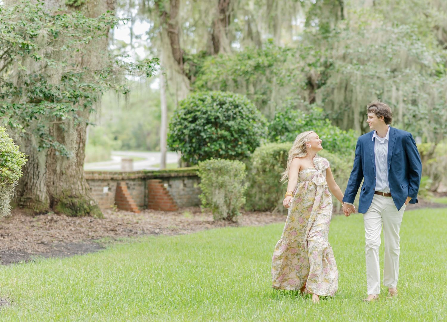 A collection of outdoor photos showing people walking and posing under Spanish moss draped trees in a park setting.