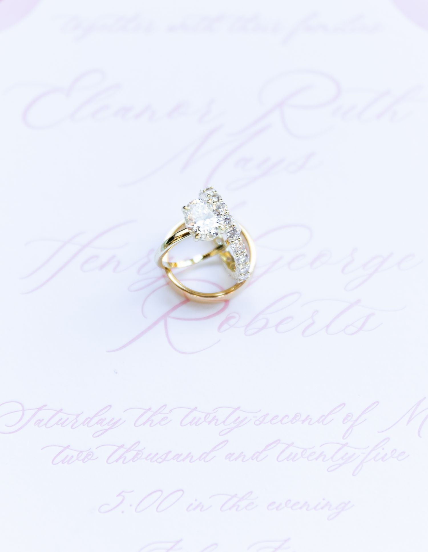 Artistically arranged oval-cut diamond engagement ring shown in three different poses on white background.