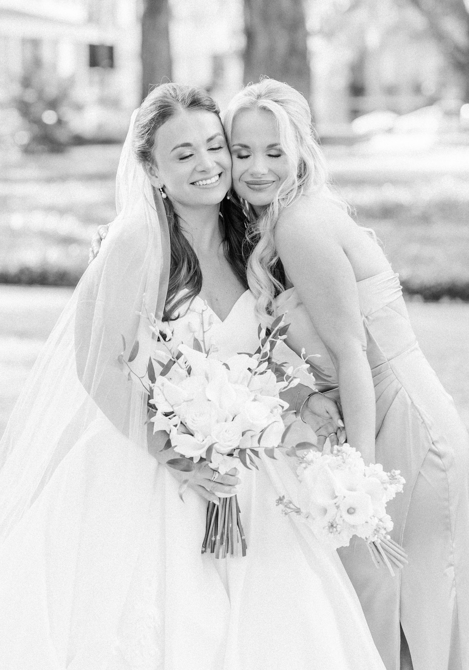 Black and white photo series showing joyful moments with white floral bouquets at an outdoor wedding celebration.