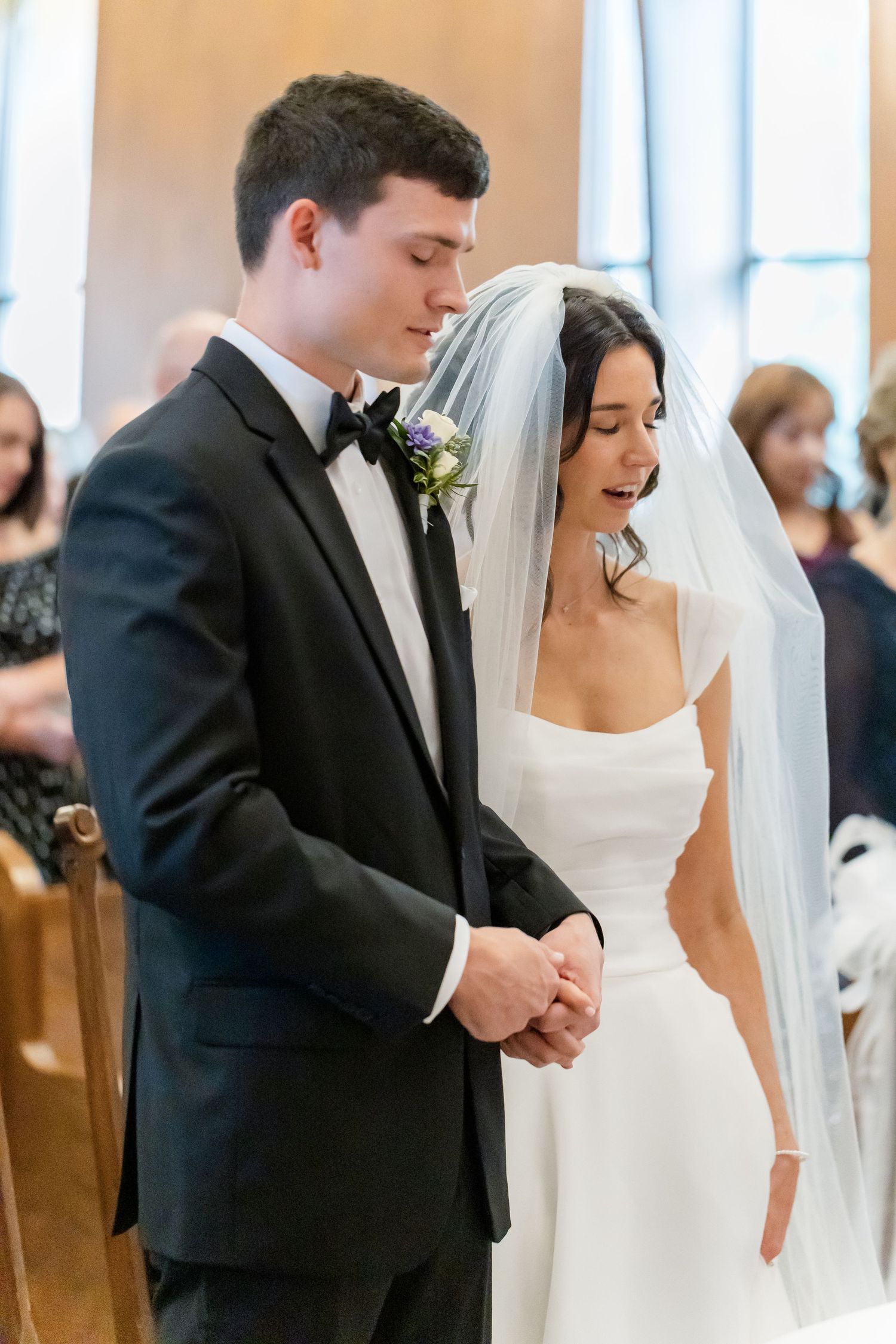Elegant wedding ceremony moments captured in a church with traditional decor and lighting.